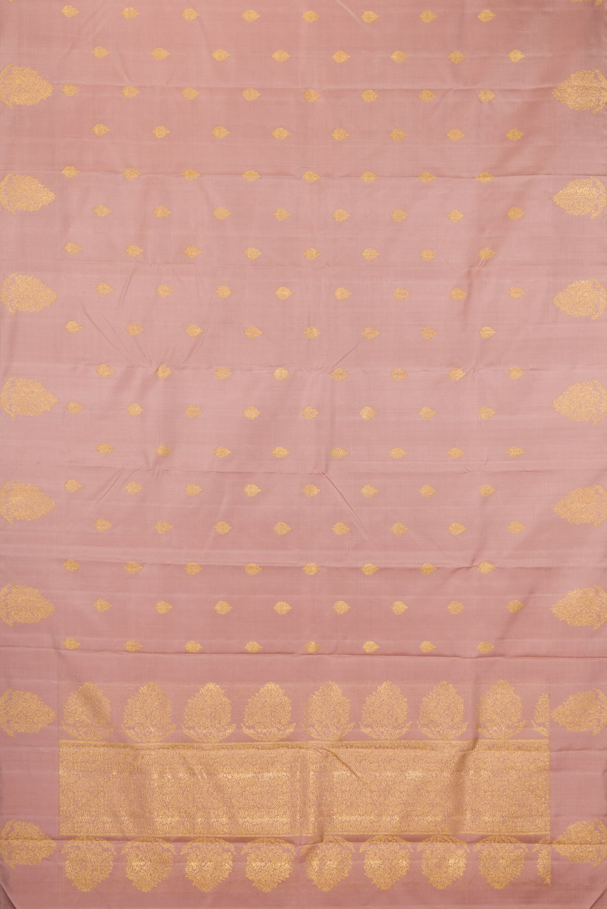 Flat view of Pure Silk Pure Zari Rose Gold Kanjivaram Saree with Zari Butta on the body and Fancy Border. 