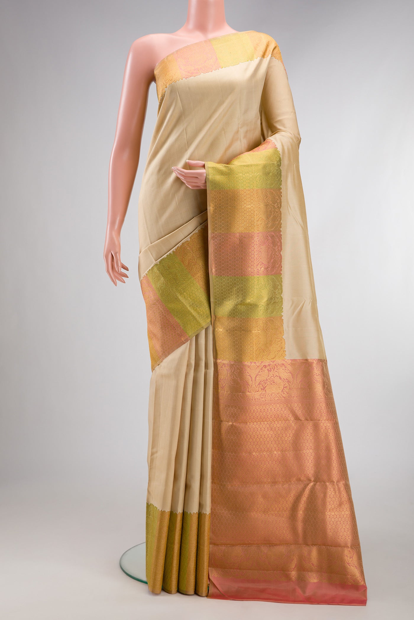 Pure Silk Pure Zari Sandal Kanjivaram Saree with Plain Body and Fancy Border.  displayed on a mannequin