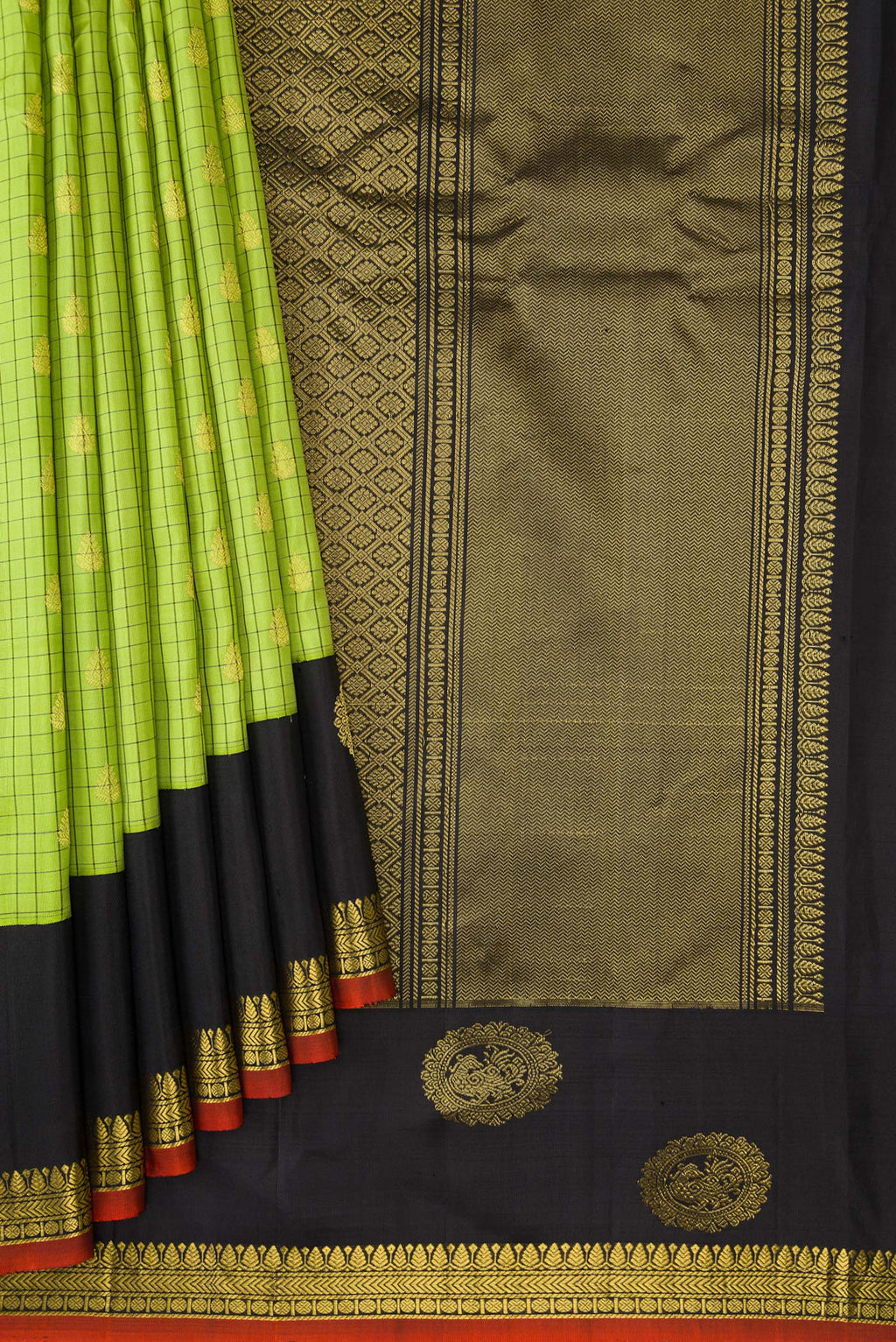 Pleats and pallu of Parrot Green Gadwal Silk Saree with Checked design on the body and Zari Border. 