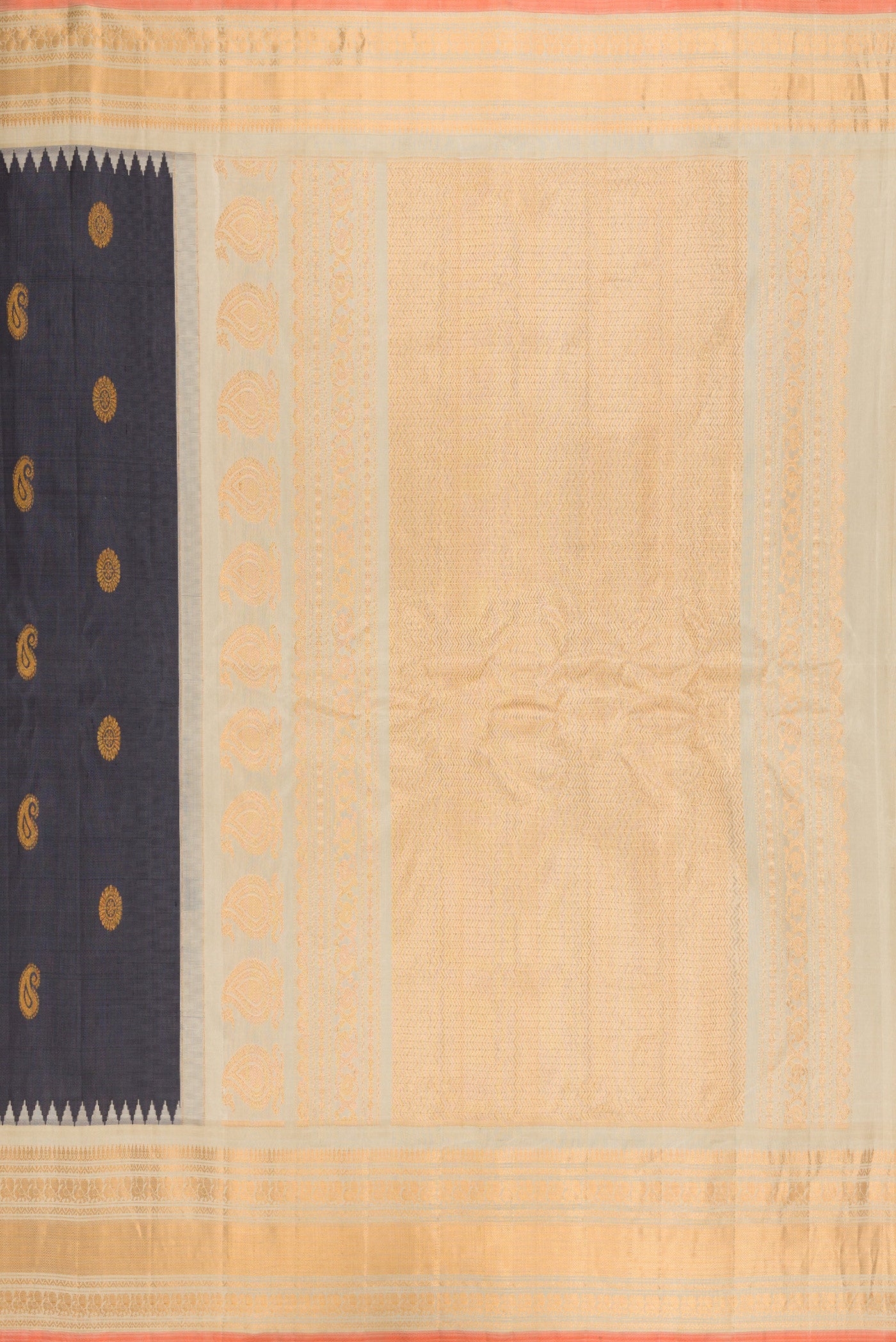 Close up image of the pallu of Grey Gadwal Silk Saree with Zari Butta on the body and Zari Border. 