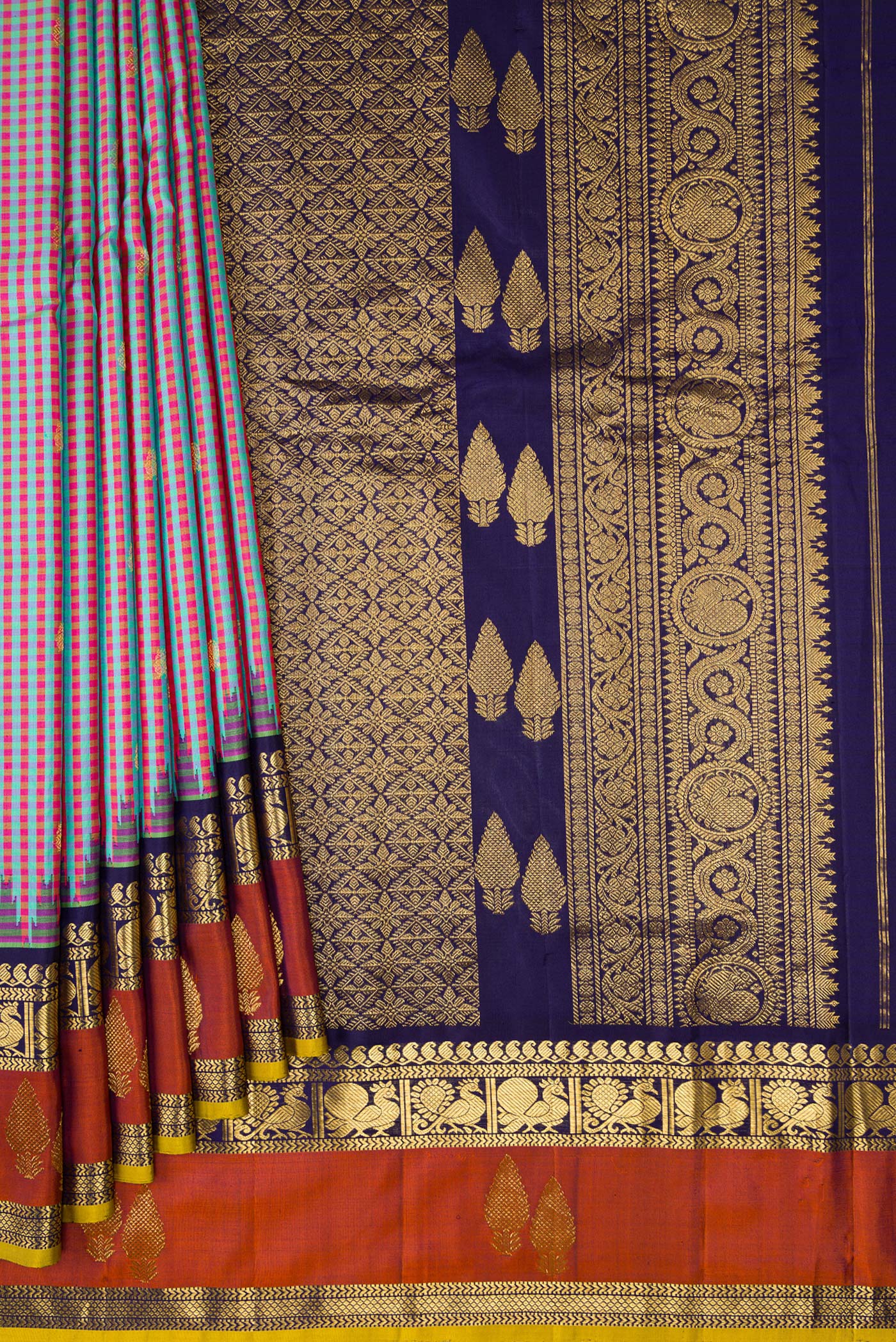 Pleats and pallu of Multi Color Gadwal Silk Saree with Checked design on the body and Zari Border. 
