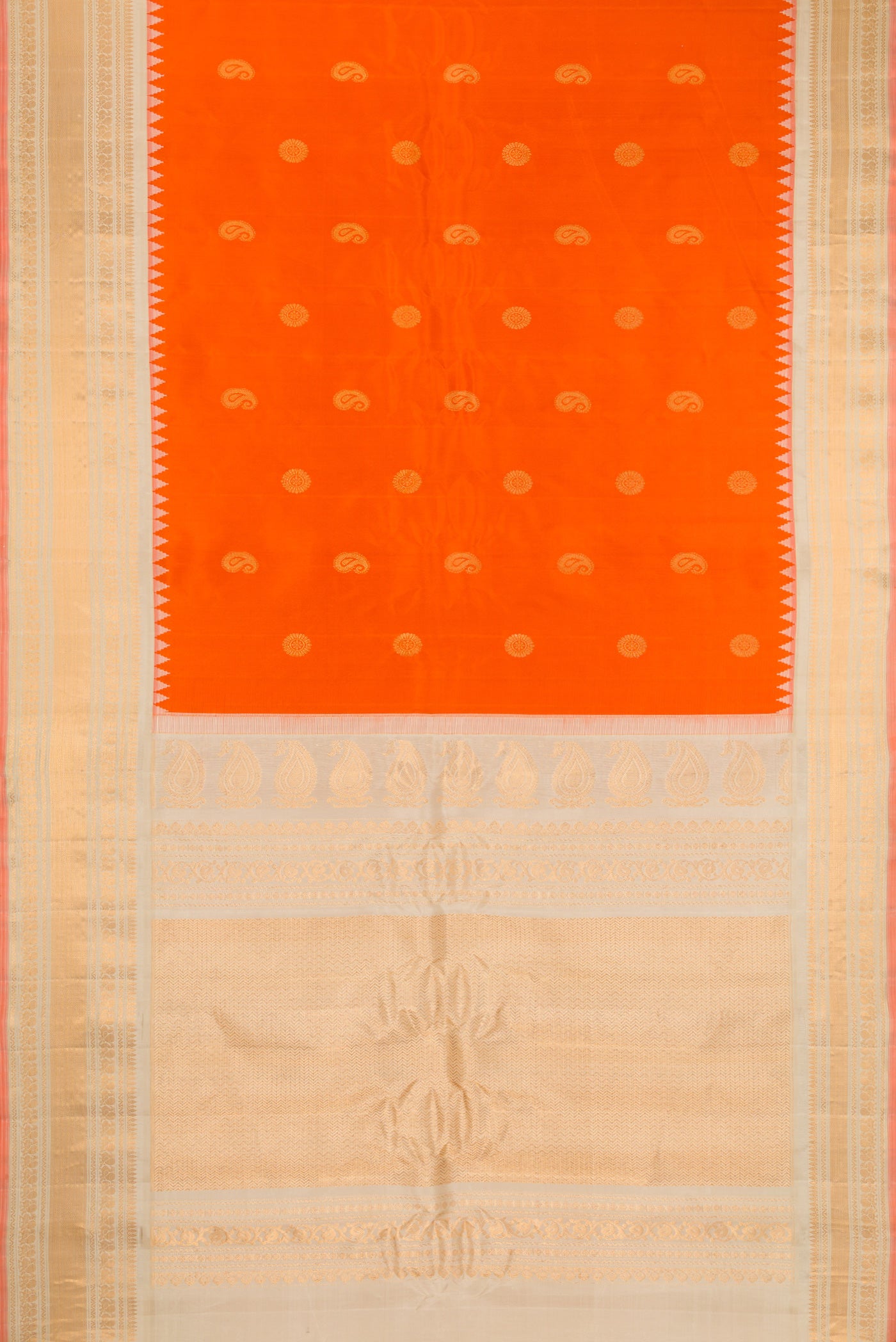 Flat view of Orange Gadwal Silk Saree with Zari Butta on the body and Zari Border. 