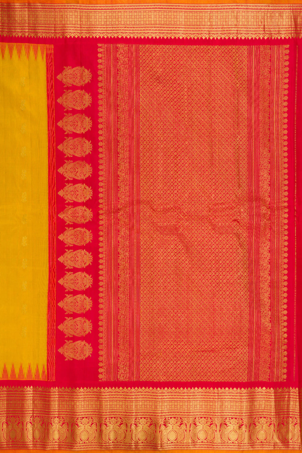 Close up image of the pallu of Mustard Gadwal Silk Saree with Zari Butta on the body and Zari Border. 
