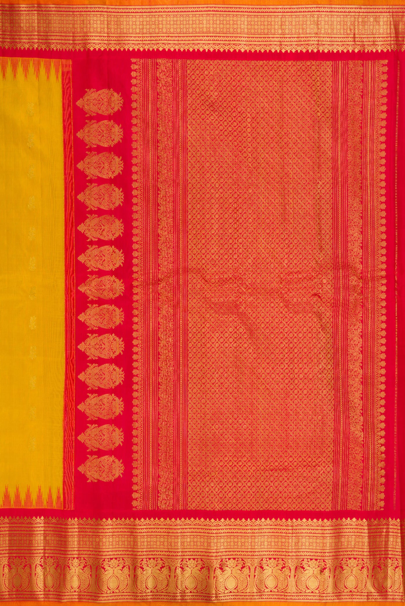 Close up image of the pallu of Mustard Gadwal Silk Saree with Zari Butta on the body and Zari Border. 