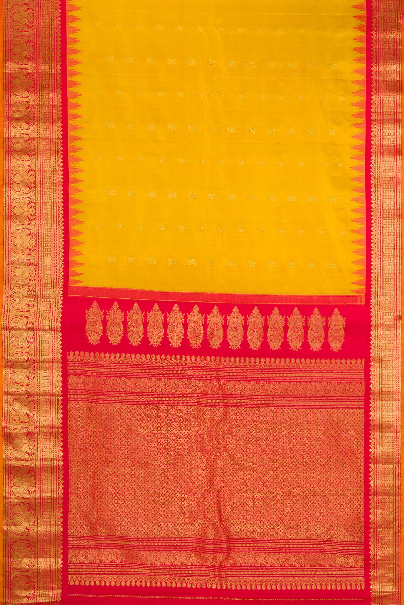 Flat view of Mustard Gadwal Silk Saree with Zari Butta on the body and Zari Border. 