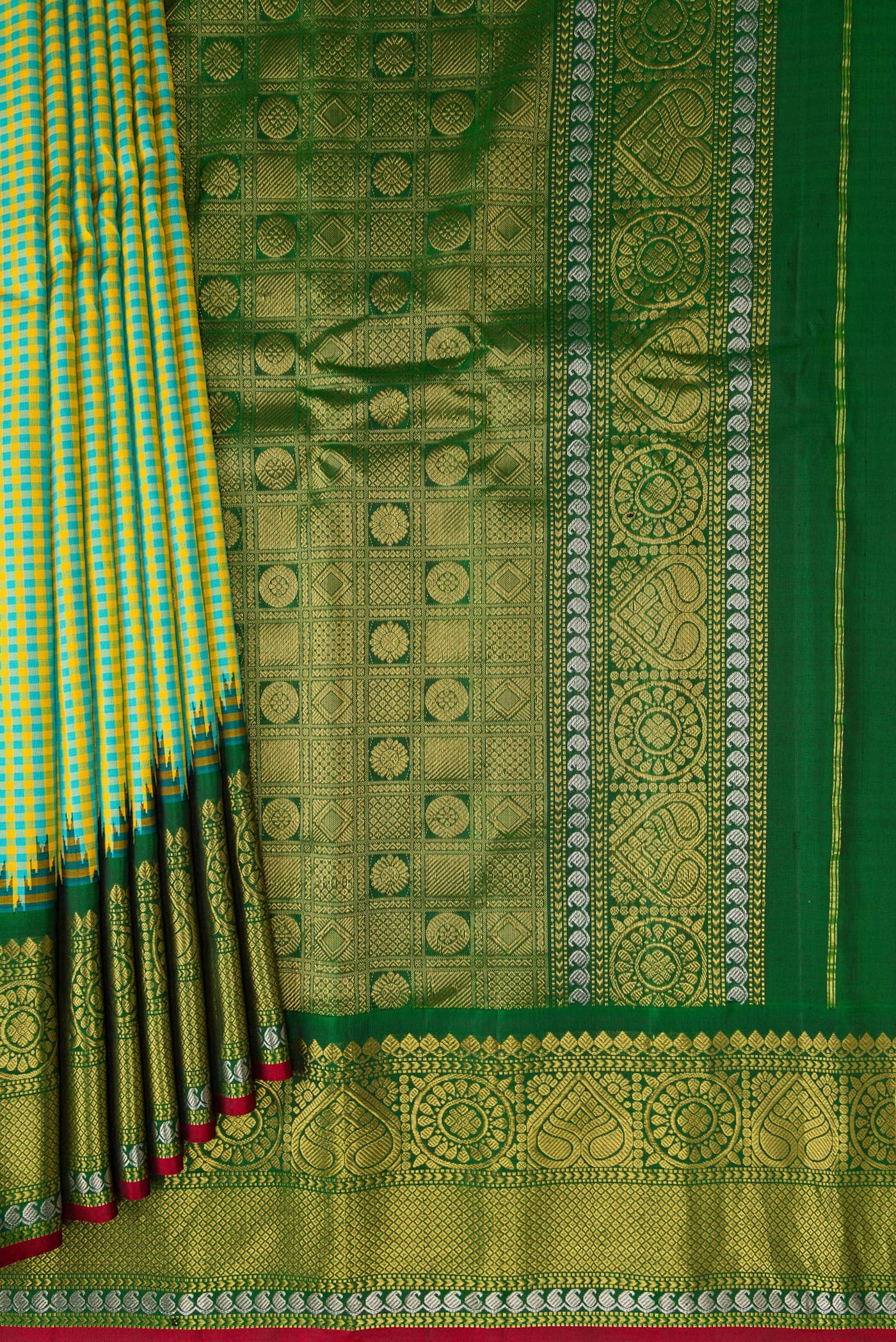 Pleats and pallu of Light Green Gadwal Silk Saree with Checked design on the body and Zari Border. 