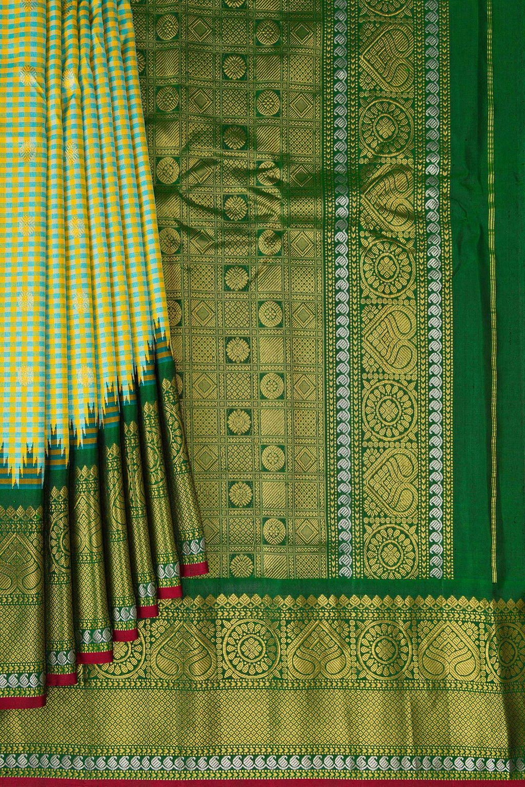 Pleats and pallu of Light Green Gadwal Silk Saree with Checked design on the body and Zari Border. 