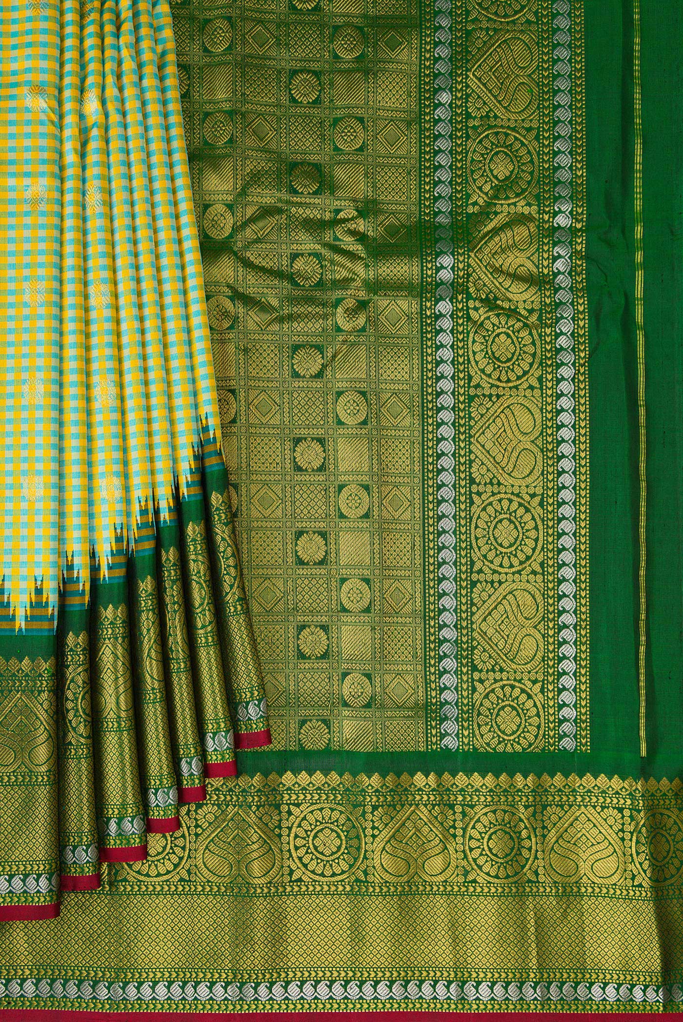 Pleats and pallu of Light Green Gadwal Silk Saree with Checked design on the body and Zari Border. 