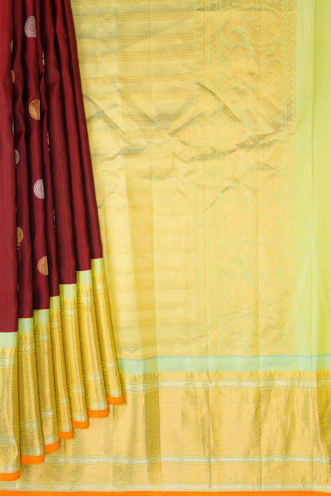 Pleats and pallu of Maroon Gadwal Silk Saree with Zari Butta on the body and Zari Border. 