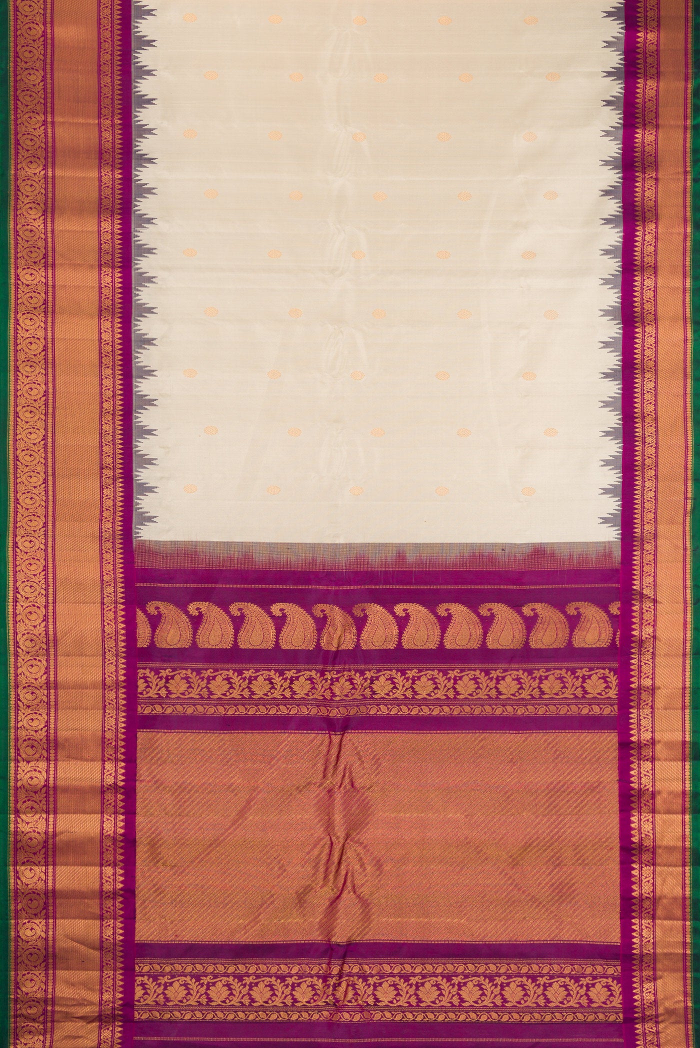 Flat view of Cream Gadwal Silk Saree with Zari Butta on the body and Zari Border. 
