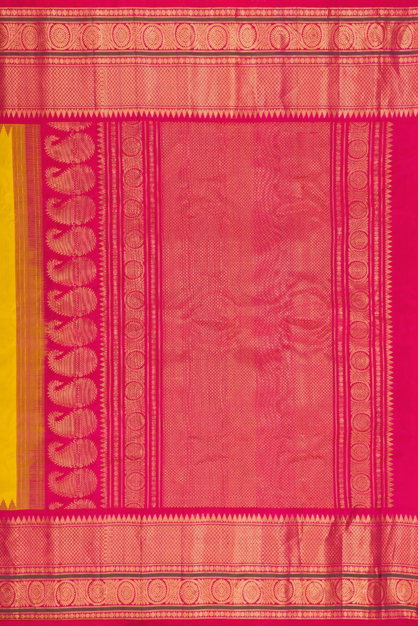 Close up image of the pallu of Mustard Gadwal Silk Saree with Zari Butta on the body and Temple Border. 