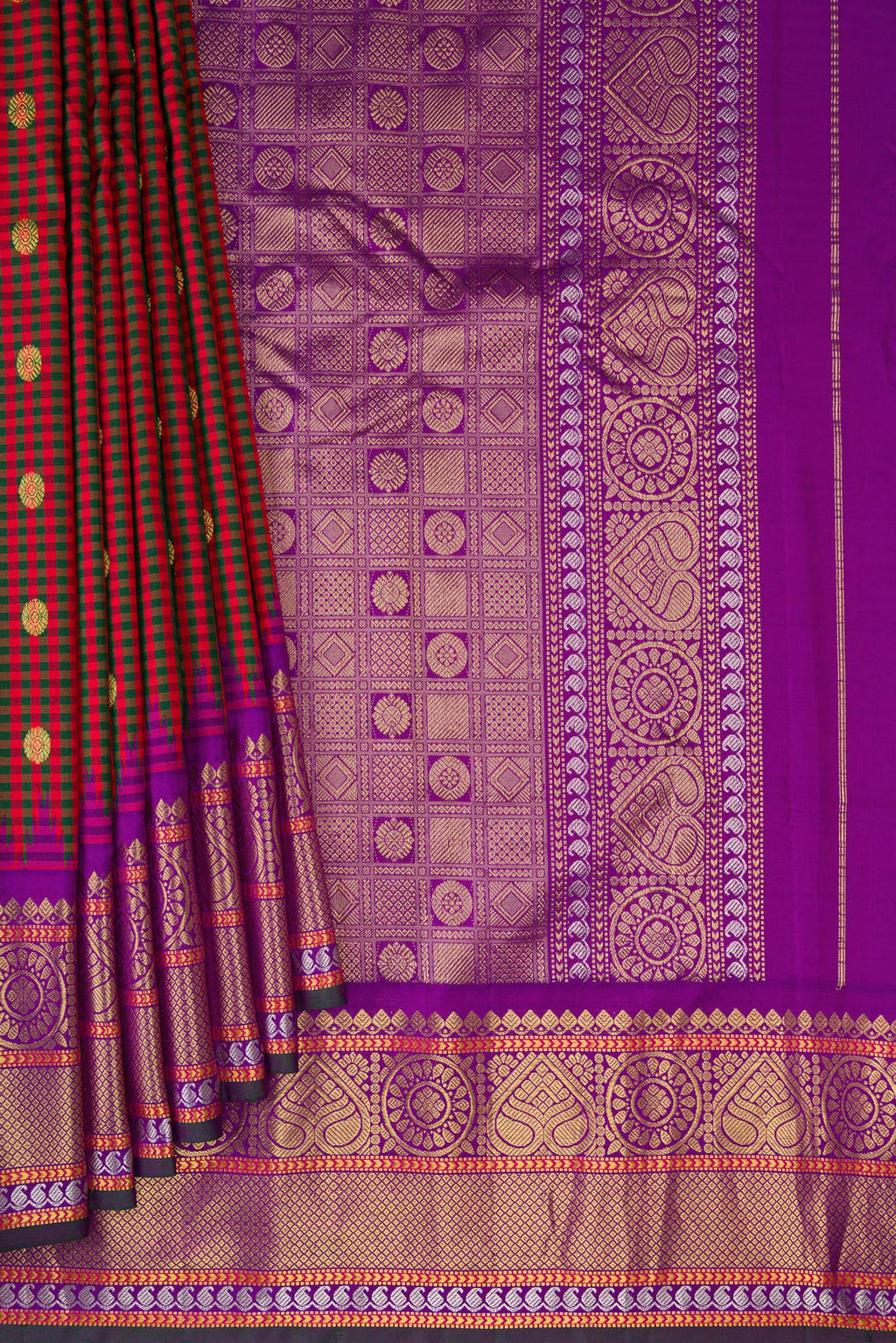 Pleats and pallu of Maroon Gadwal Silk Saree with Checked design on the body and Zari Border. 