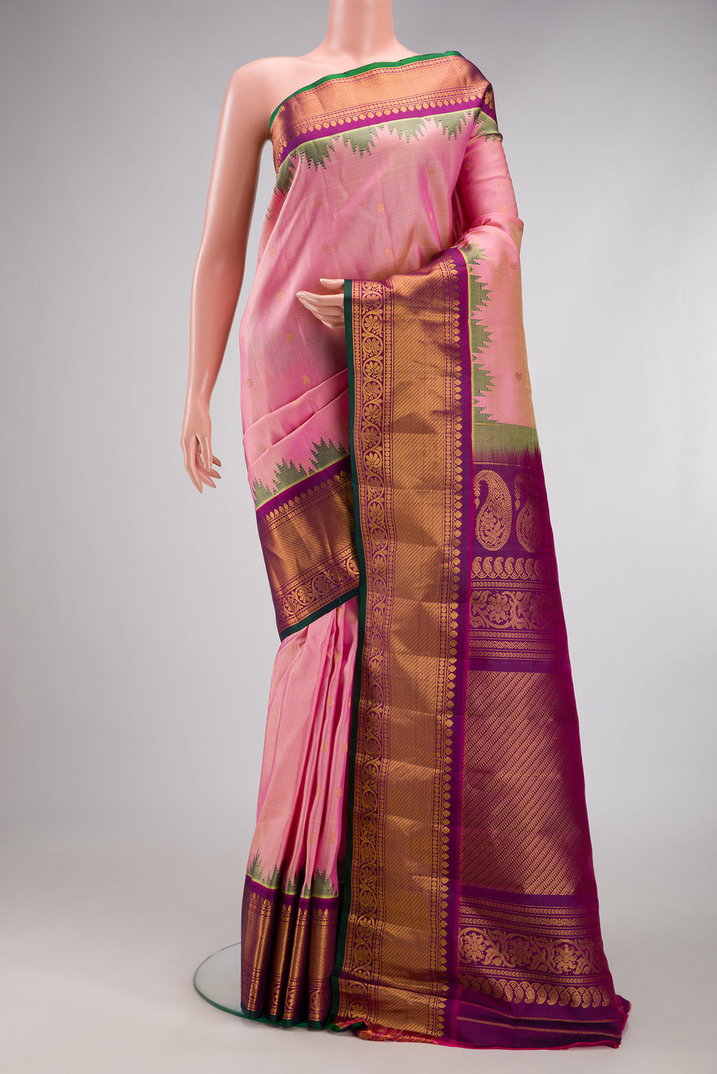 Rose pink Gadwal Silk Saree with Zari Butta on the body and Zari Border.  displayed on a mannequin