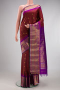 Multi Color Gadwal Silk Saree with Checked design on the body and Zari Border.  displayed on a mannequin