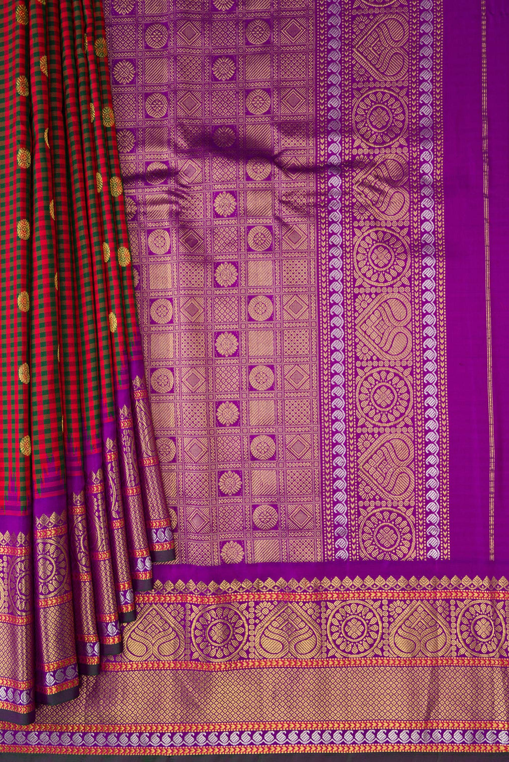 Pleats and pallu of Multi Color Gadwal Silk Saree with Checked design on the body and Zari Border. 