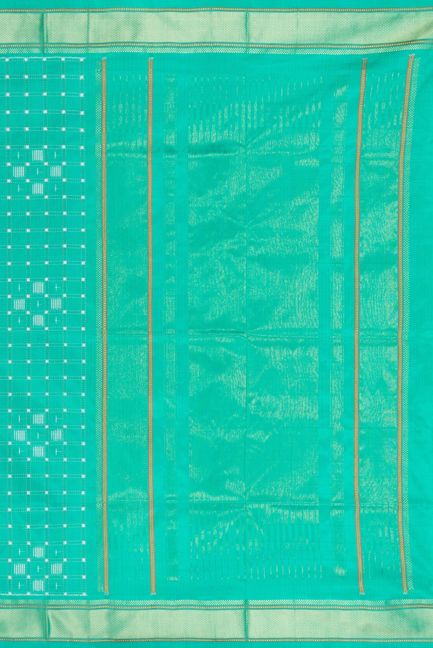 Close up image of the pallu of Sea Green Double Ikat Saree with Pure Ikat on the body and Zari Border. 