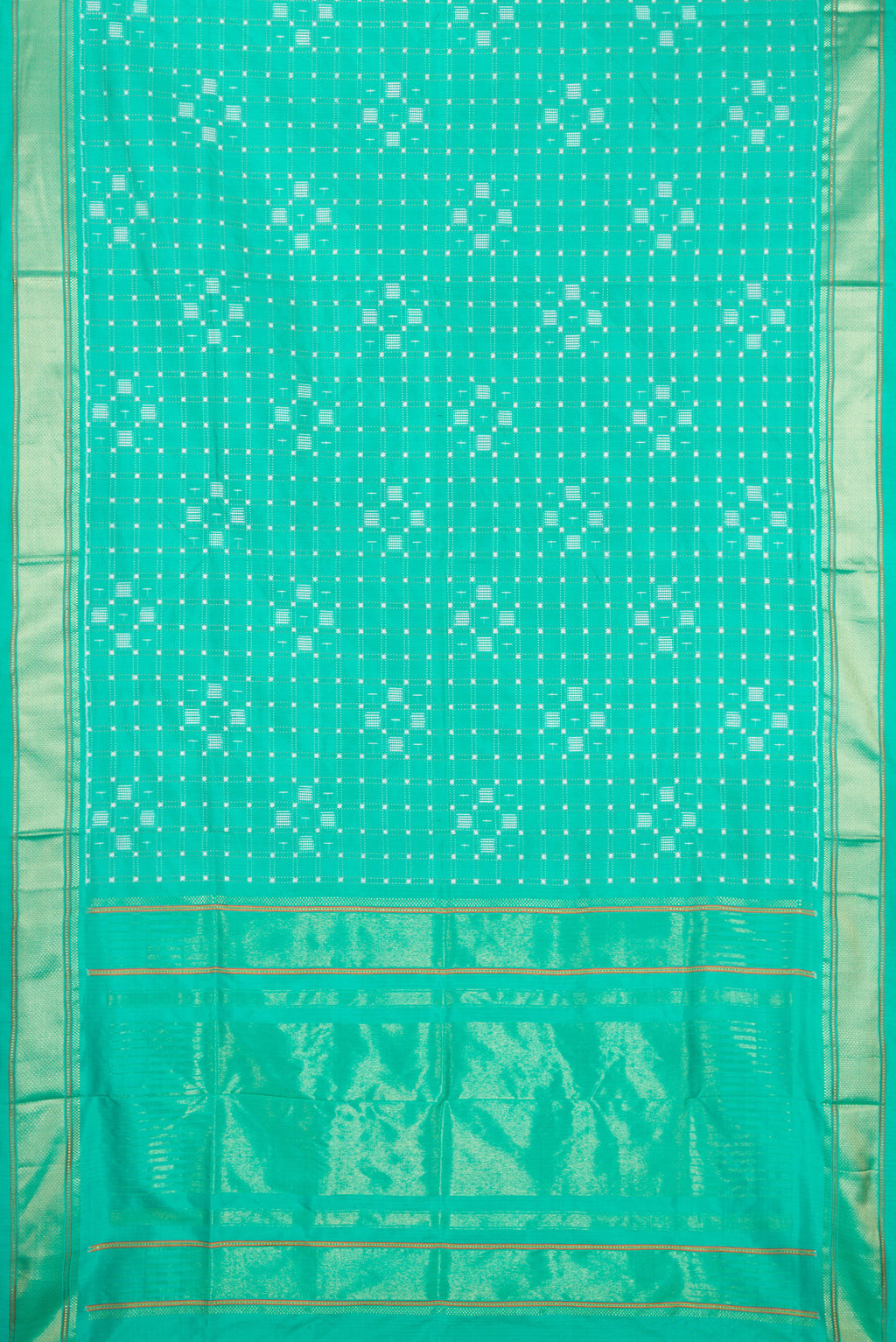 Flat view of Sea Green Double Ikat Saree with Pure Ikat on the body and Zari Border. 