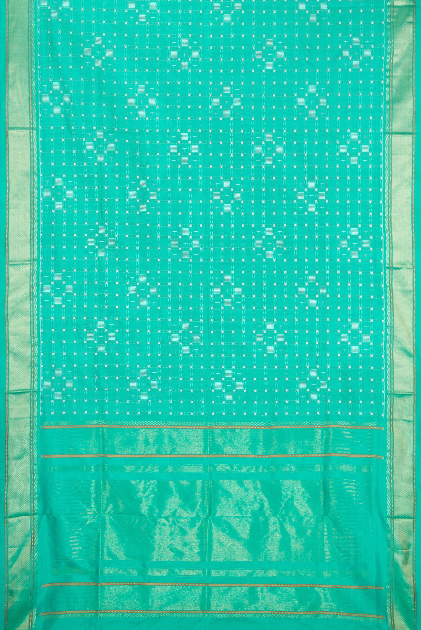 Flat view of Sea Green Double Ikat Saree with Pure Ikat on the body and Zari Border. 