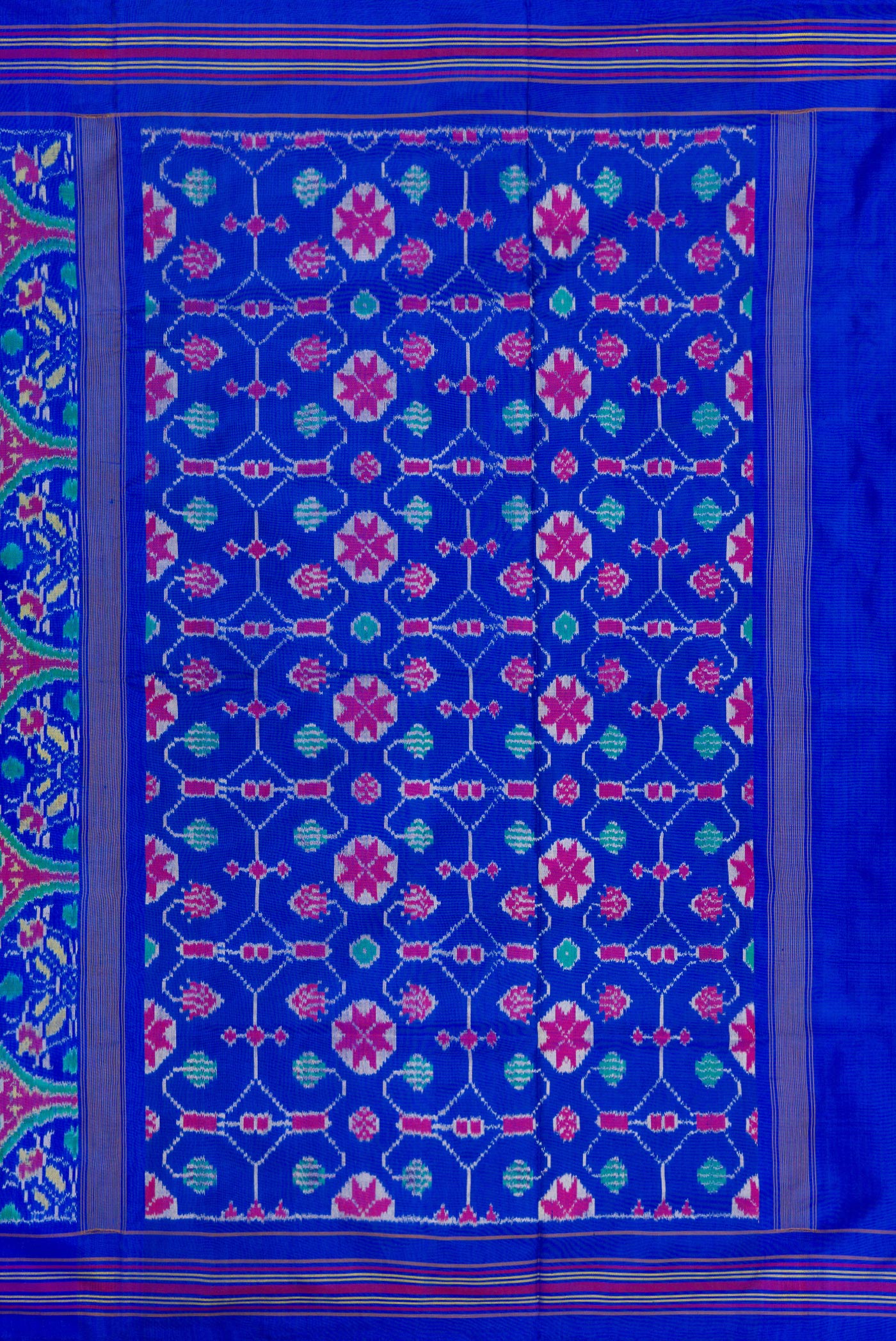 Close up image of the pallu of Royal Blue Double Ikat Saree with Pure Ikat on the body and Thread Border. 