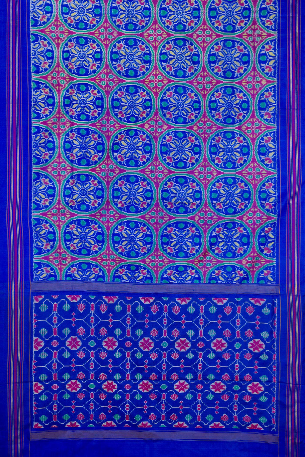 Flat view of Royal Blue Double Ikat Saree with Pure Ikat on the body and Thread Border. 