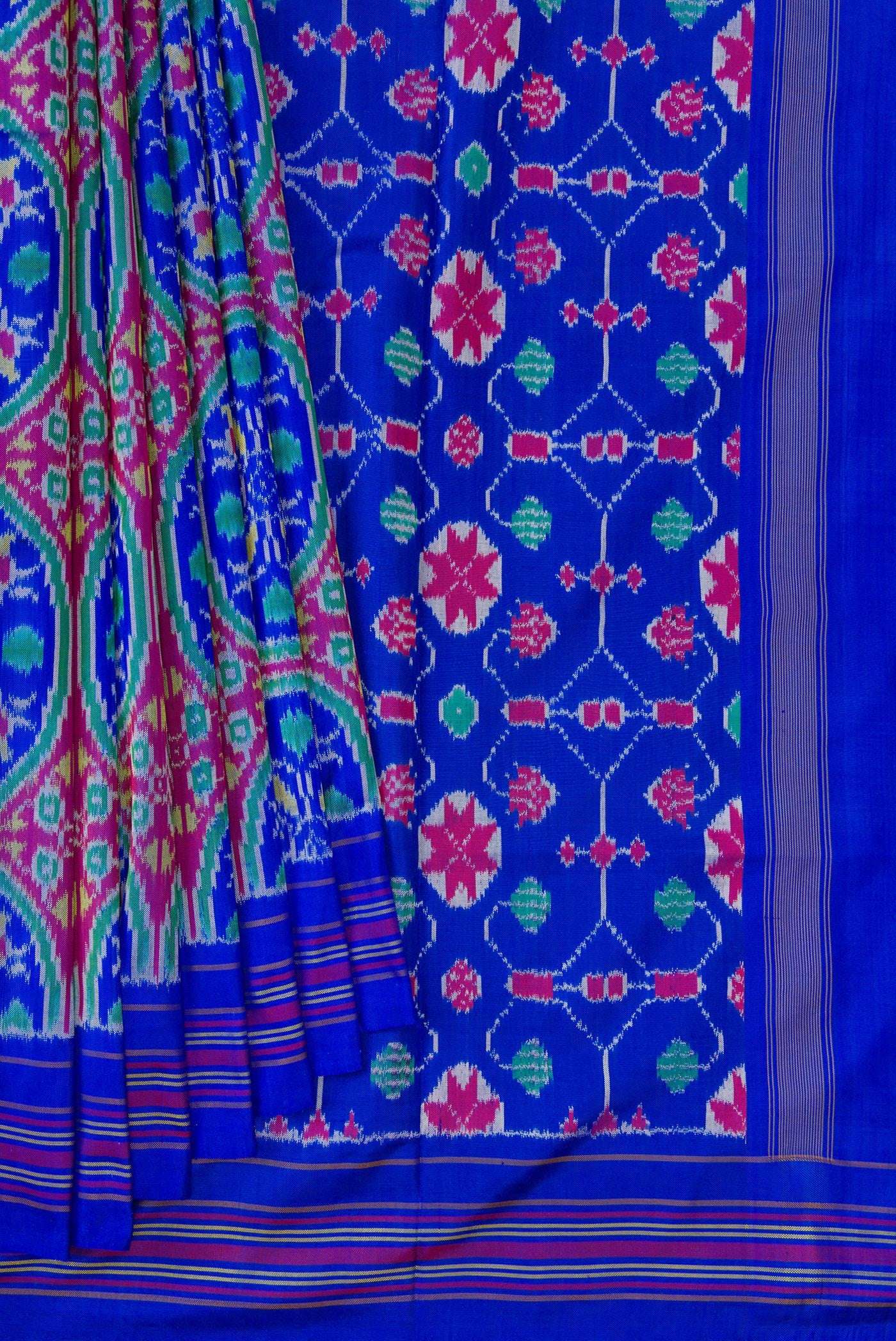 Pleats and pallu of Royal Blue Double Ikat Saree with Pure Ikat on the body and Thread Border. 