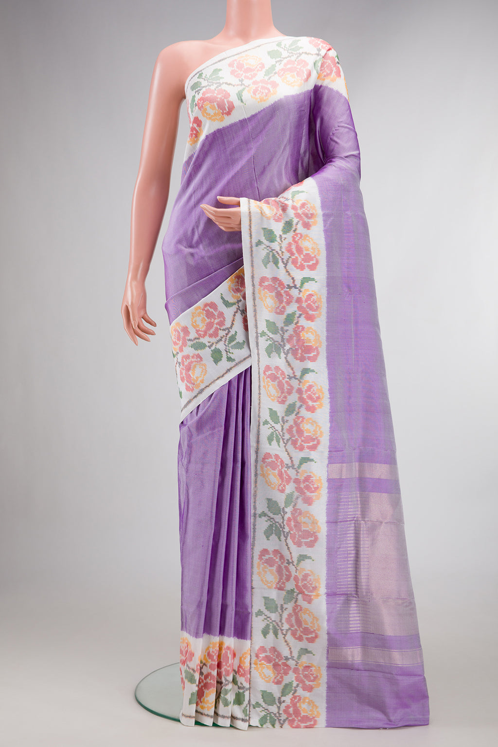 Pure Silk Lavender Double Ikat Saree with Plain Body and Ikat Border.  displayed on a mannequin