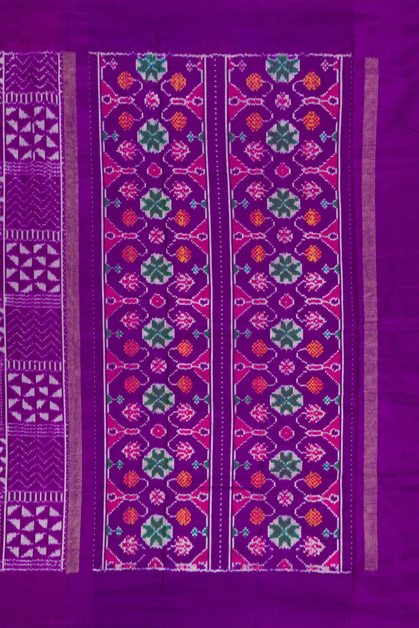 Close up image of the pallu of Violet Double Ikat Saree with Pure Ikat on the body and Plain Border. 