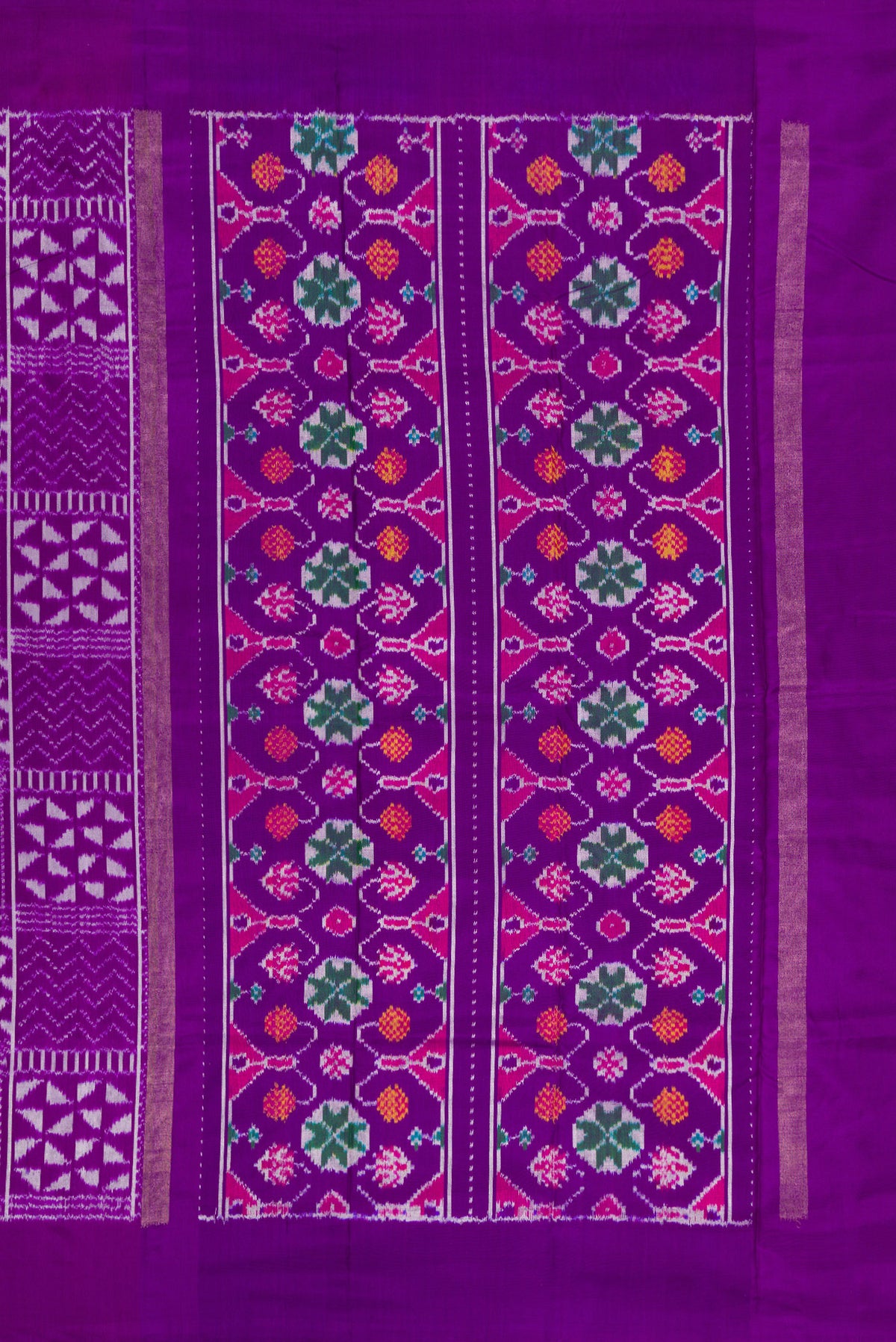 Close up image of the pallu of Violet Double Ikat Saree with Pure Ikat on the body and Plain Border. 