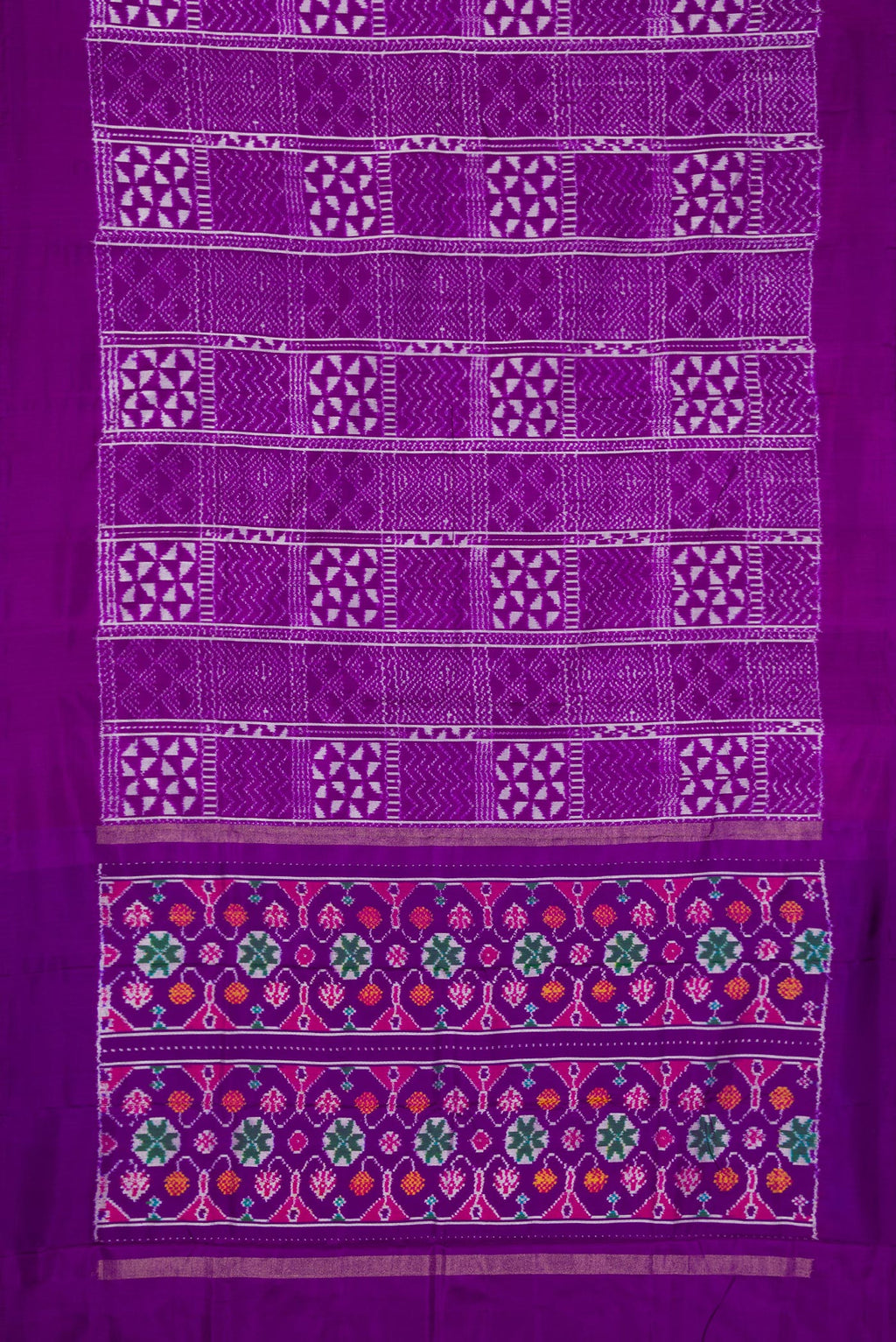 Flat view of Violet Double Ikat Saree with Pure Ikat on the body and Plain Border. 