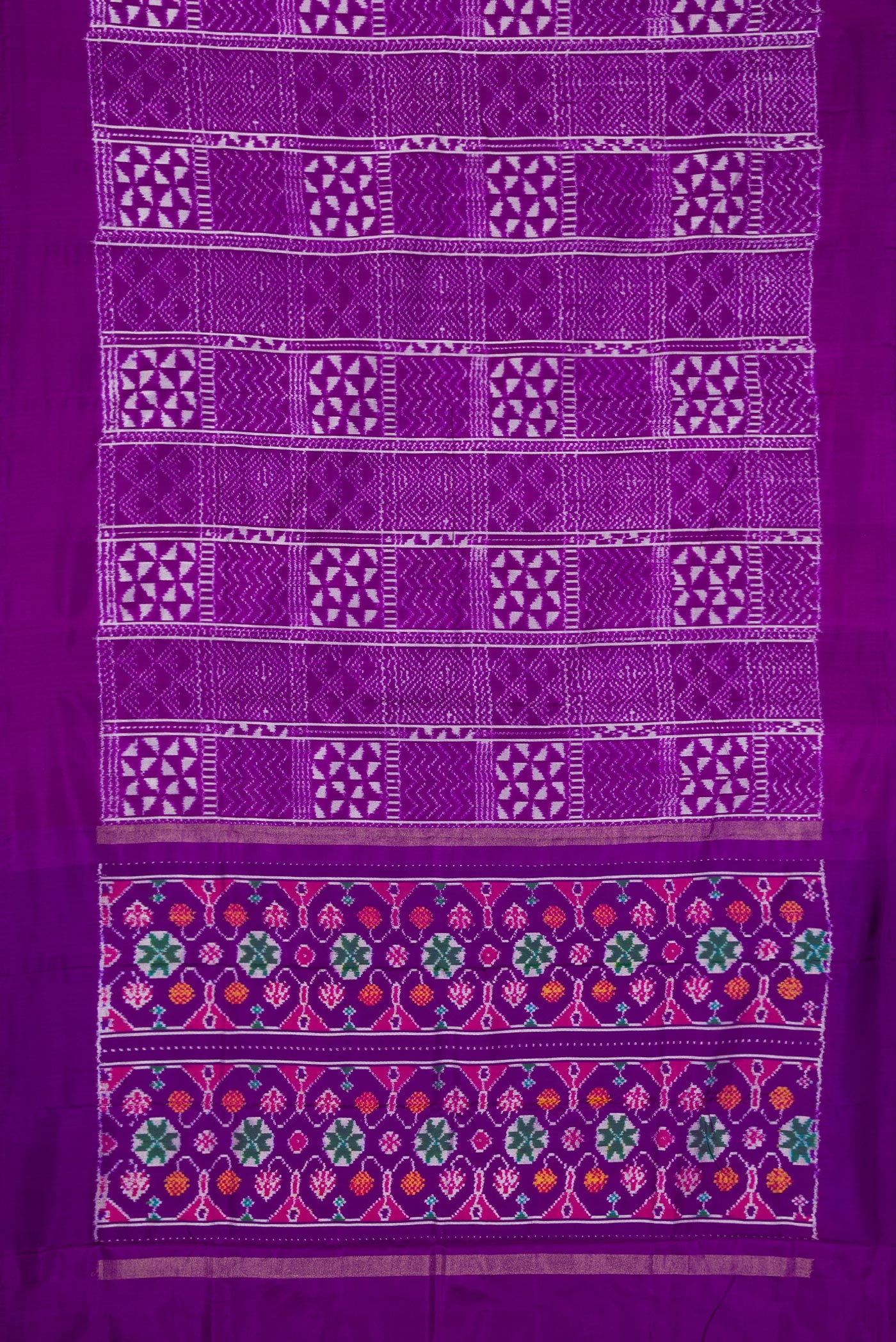 Flat view of Violet Double Ikat Saree with Pure Ikat on the body and Plain Border. 