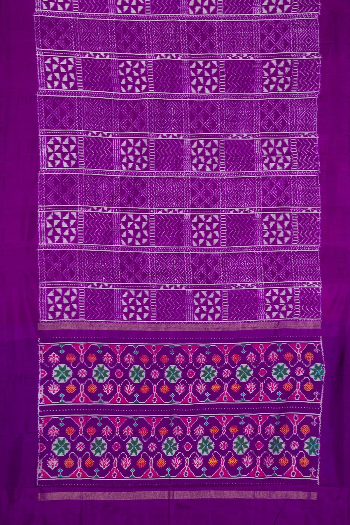 Flat view of Violet Double Ikat Saree with Pure Ikat on the body and Plain Border. 