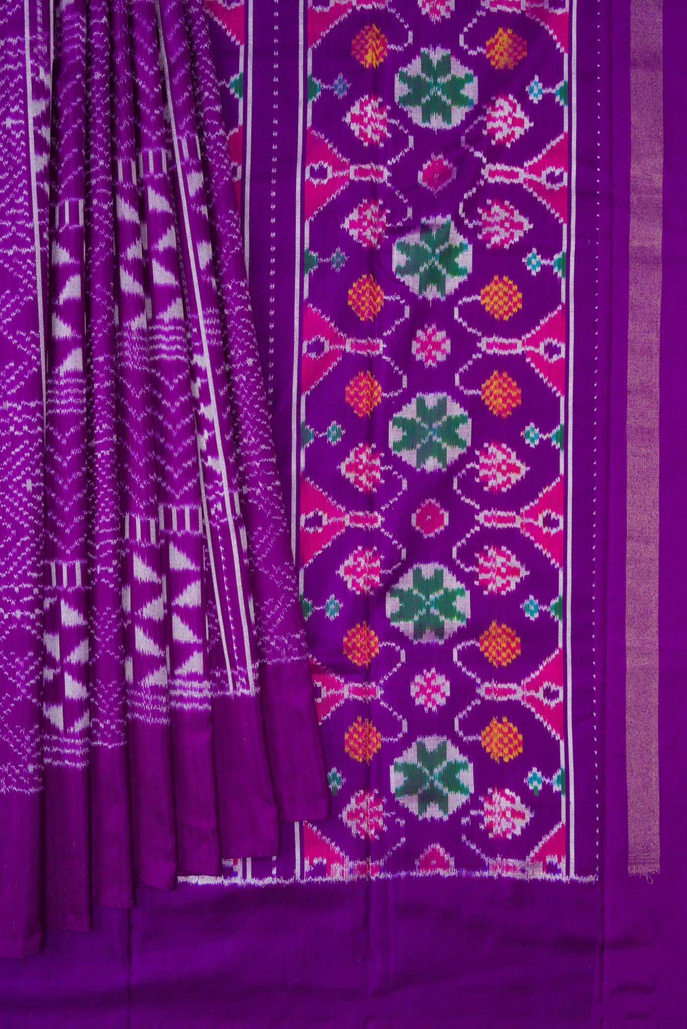 Pleats and pallu of Violet Double Ikat Saree with Pure Ikat on the body and Plain Border. 
