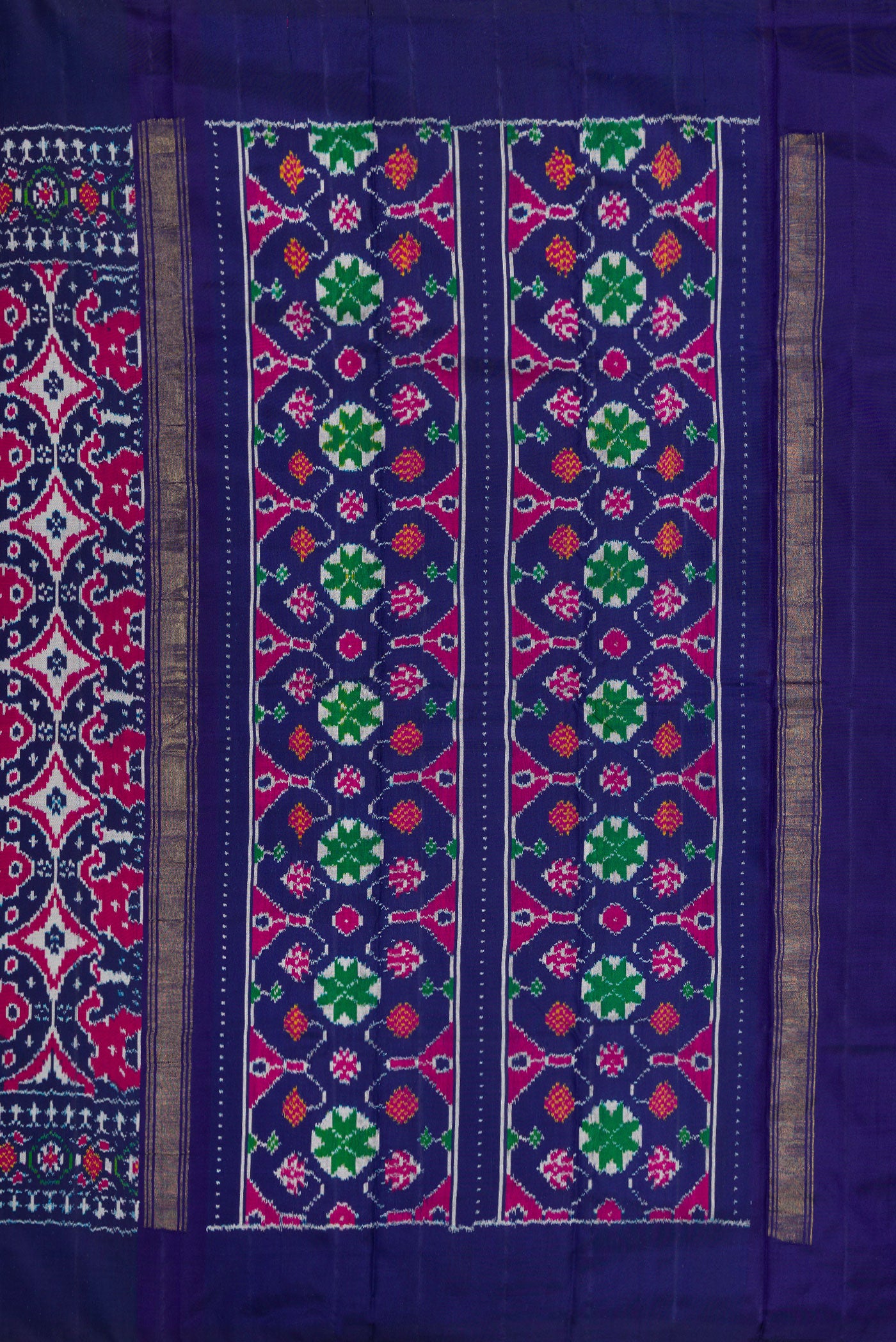 Close up image of the pallu of Navy Blue Double Ikat Saree with Pure Ikat on the body and Plain Border. 