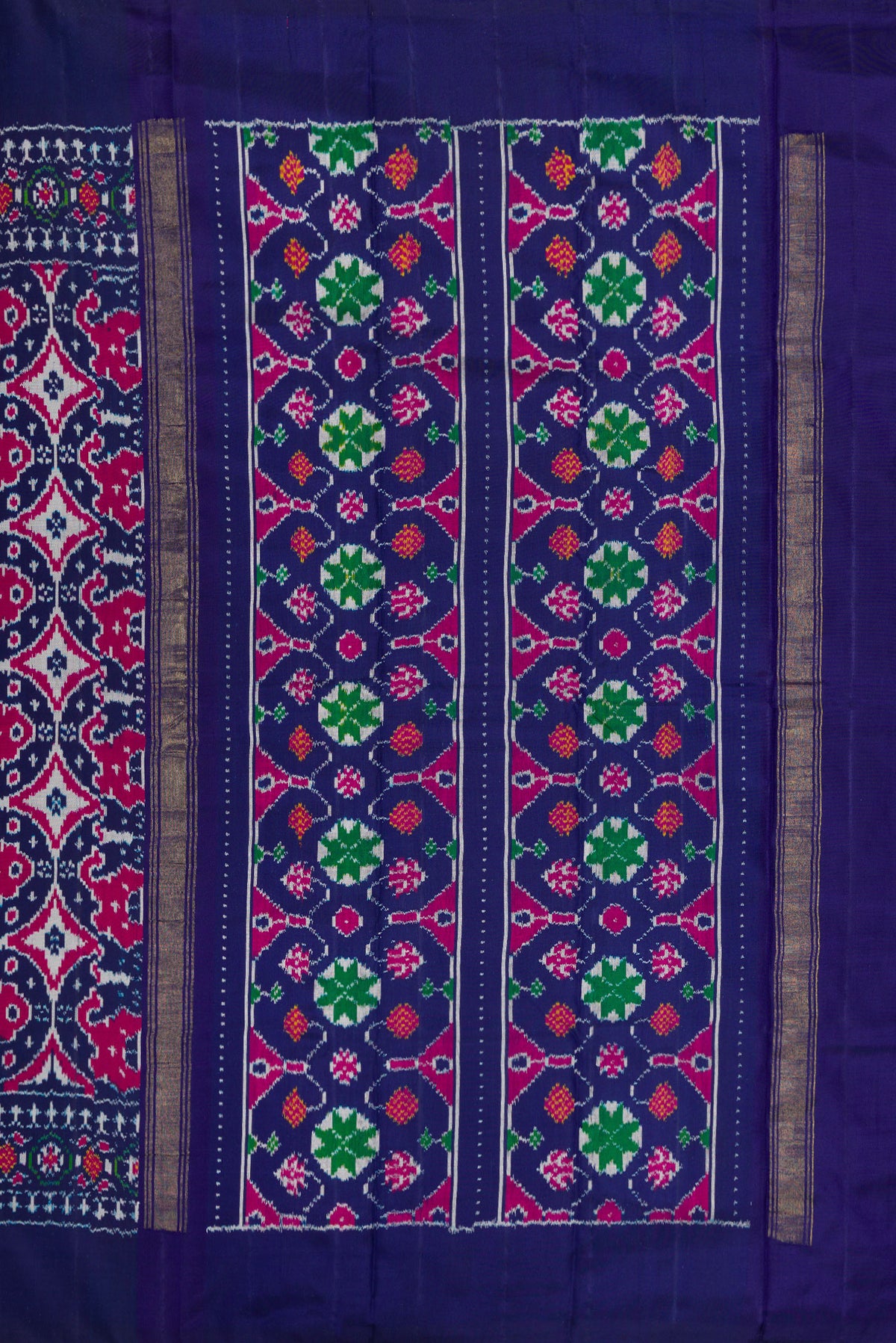 Close up image of the pallu of Navy Blue Double Ikat Saree with Pure Ikat on the body and Plain Border. 