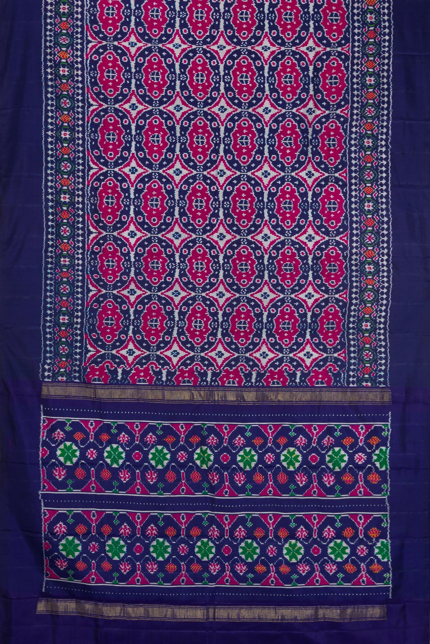 Flat view of Navy Blue Double Ikat Saree with Pure Ikat on the body and Plain Border. 