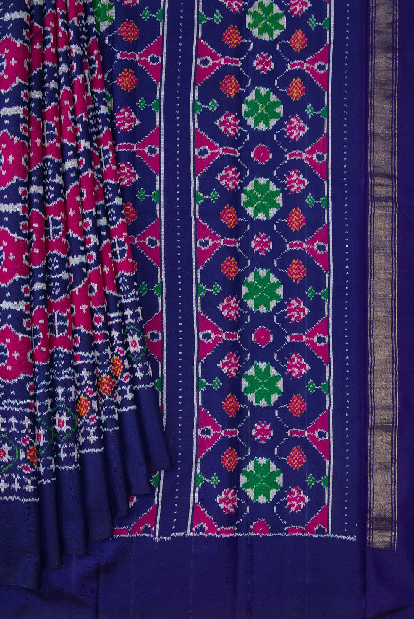 Pleats and pallu of Navy Blue Double Ikat Saree with Pure Ikat on the body and Plain Border. 