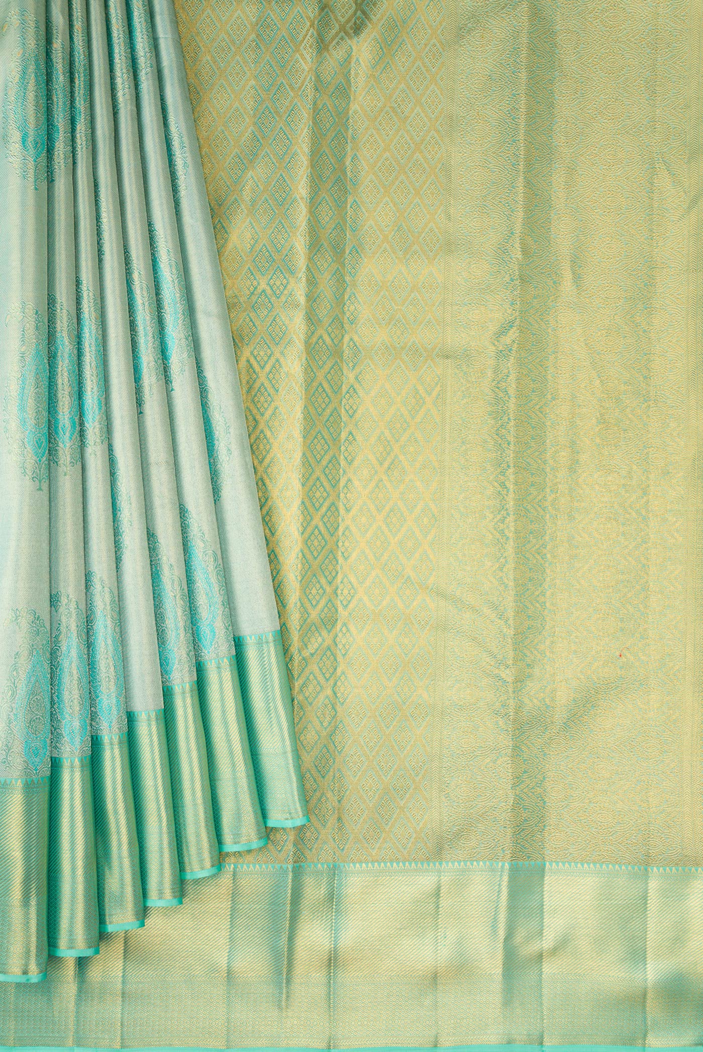 Pleats and pallu of Sea Green Dual Tone Kanchipuram Tissue Silk Saree with Zari Brocade on the body and Zari Border. 