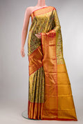 Green Dual Tone Kanchipuram Tissue Saree with Zari Brocade on the body and Fancy Border.  displayed on a mannequin