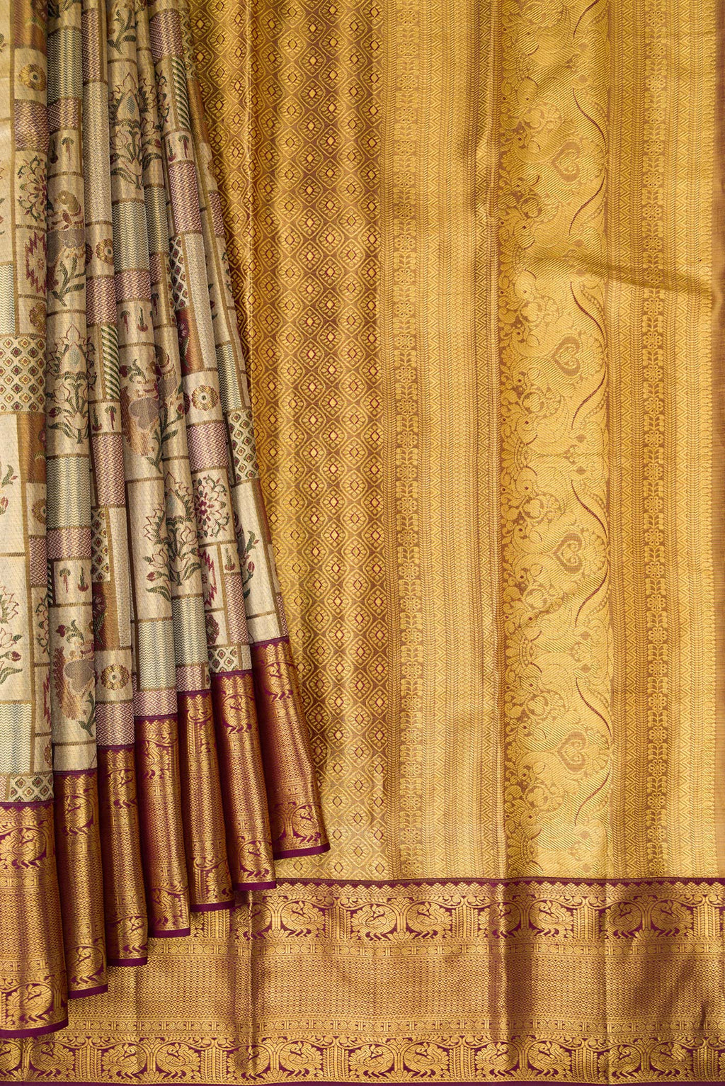 Pleats and pallu of Gold Dual Tone Kanjivaram Tissue Saree with Zari Brocade on the body and Fancy Border. 