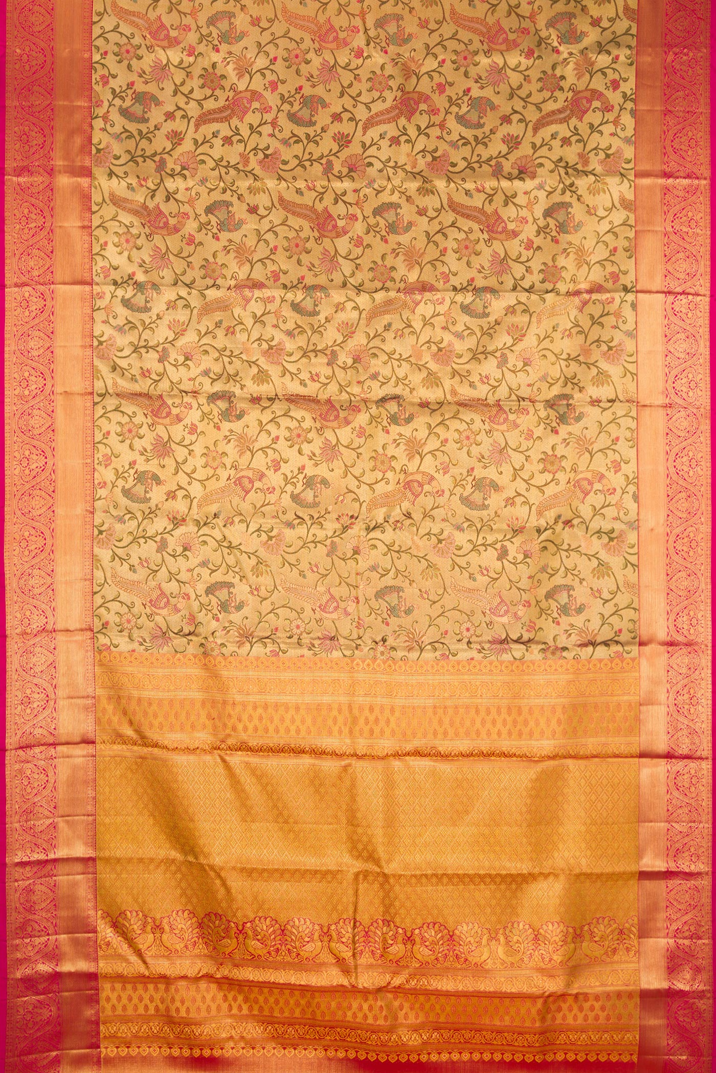 Flat view of Gold Dual Tone Kanjivaram Tissue Silk Saree with Zari Brocade on the body and Fancy Border. 