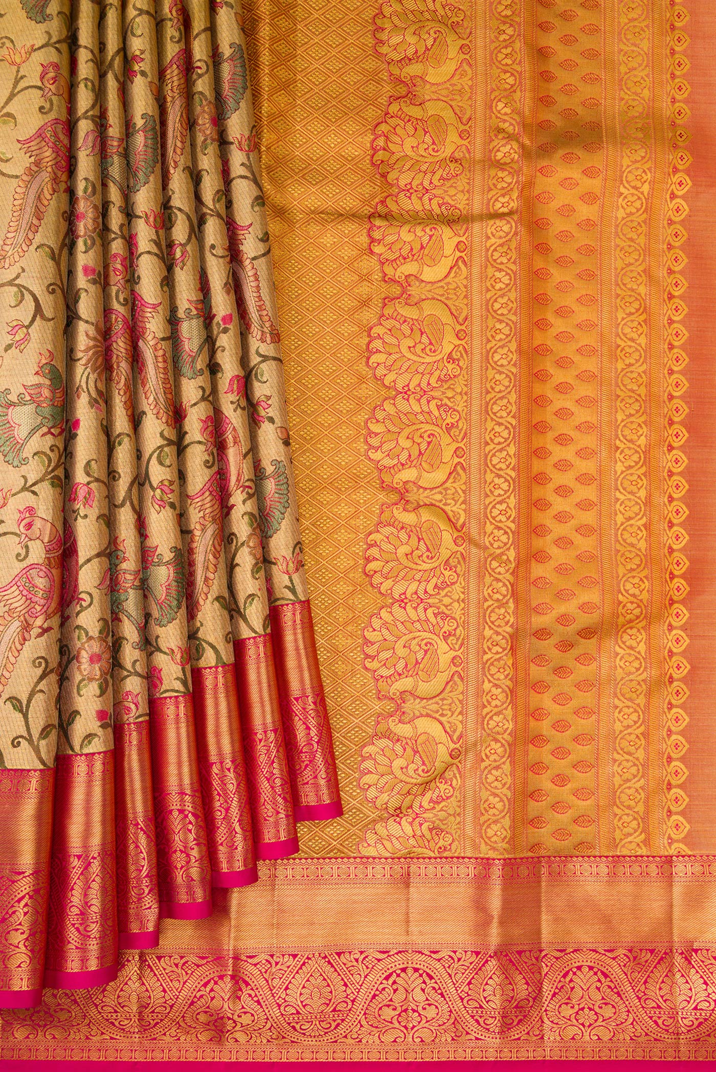 Pleats and pallu of Gold Dual Tone Kanjivaram Tissue Silk Saree with Zari Brocade on the body and Fancy Border. 