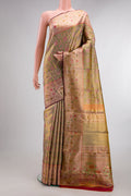 Green Dual Tone Kanjivaram Tissue Saree with Zari Brocade on the body and Fancy Border.  displayed on a mannequin