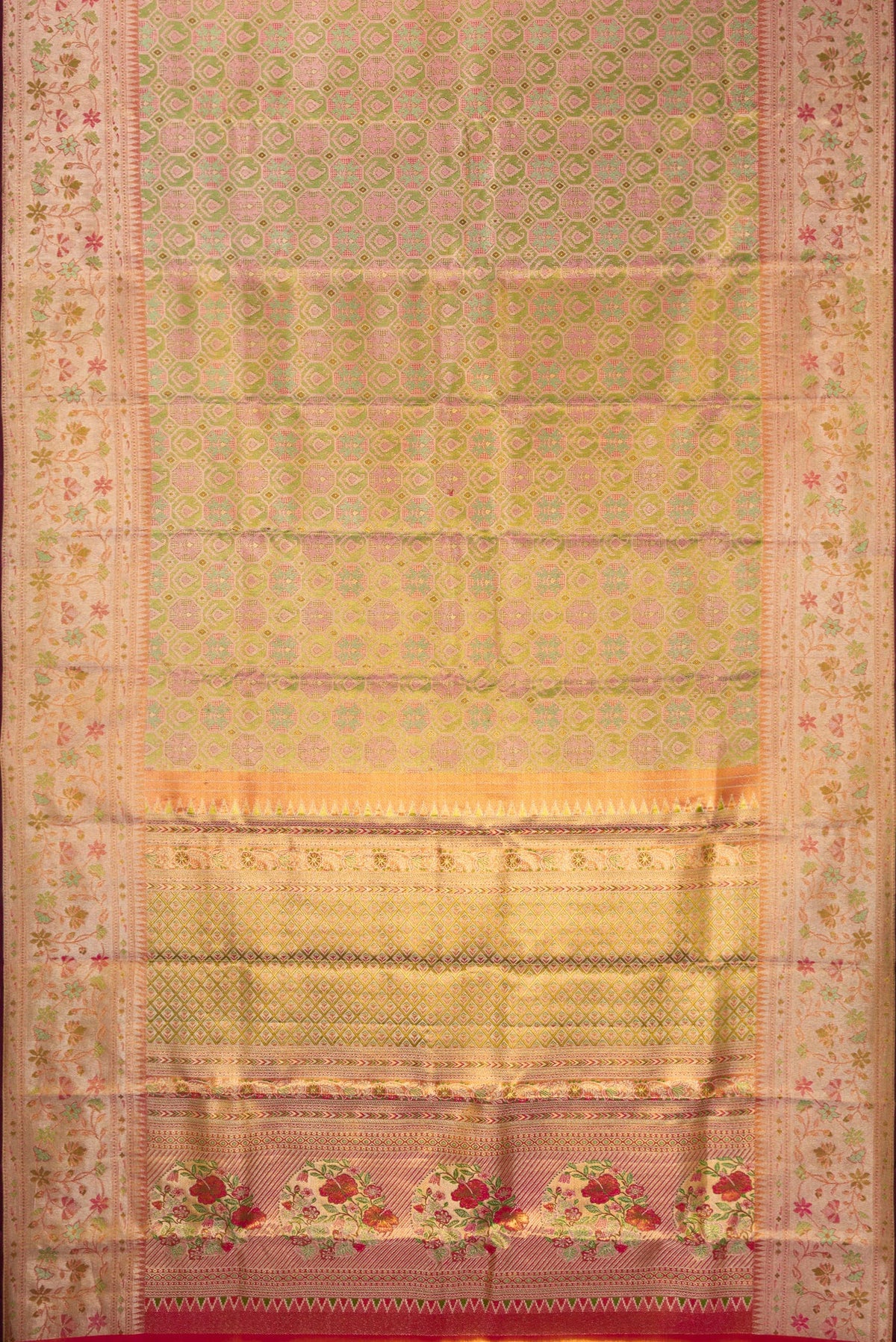 Flat view of Green Dual Tone Kanjivaram Tissue Saree with Zari Brocade on the body and Fancy Border. 