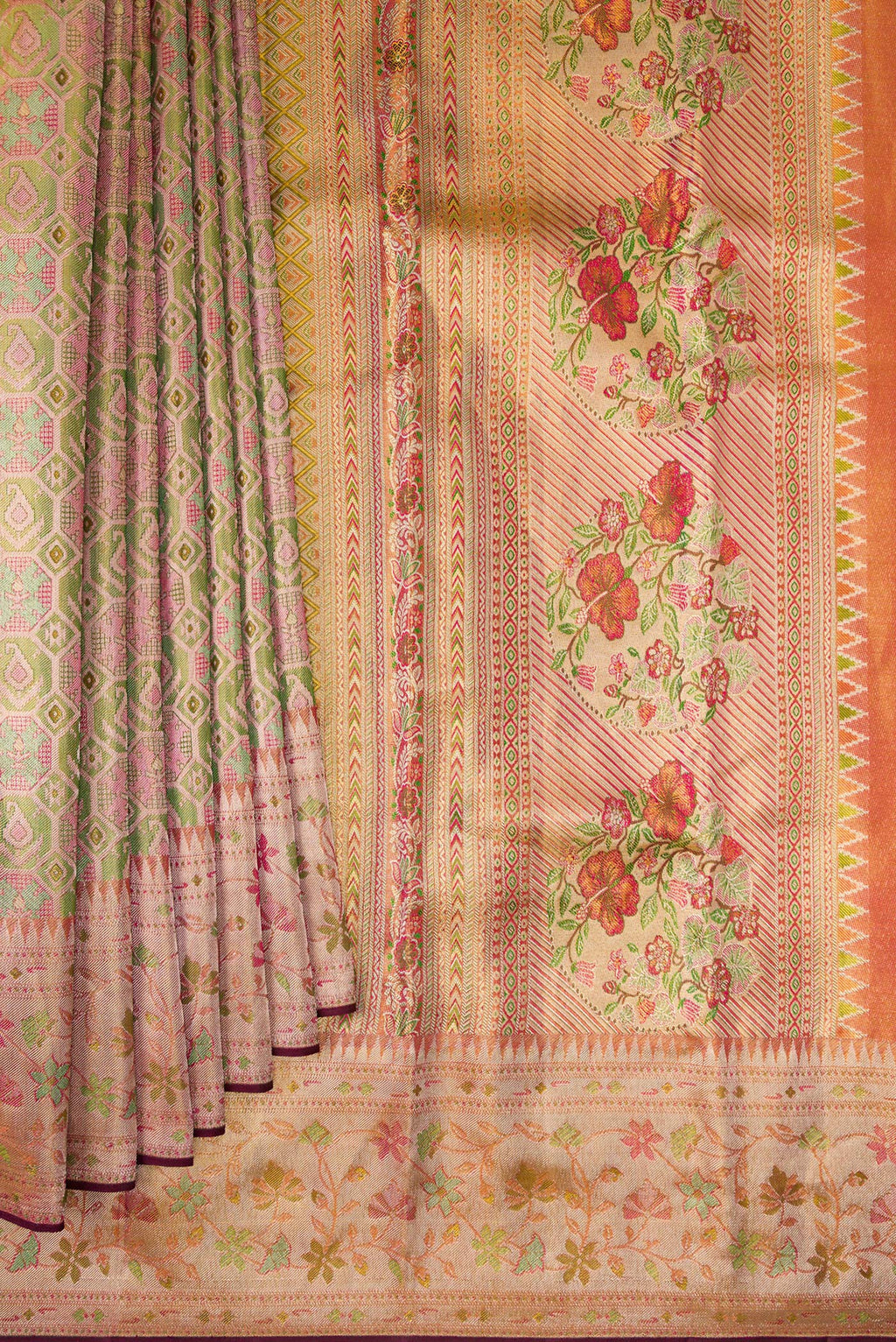 Pleats and pallu of Green Dual Tone Kanjivaram Tissue Saree with Zari Brocade on the body and Fancy Border. 