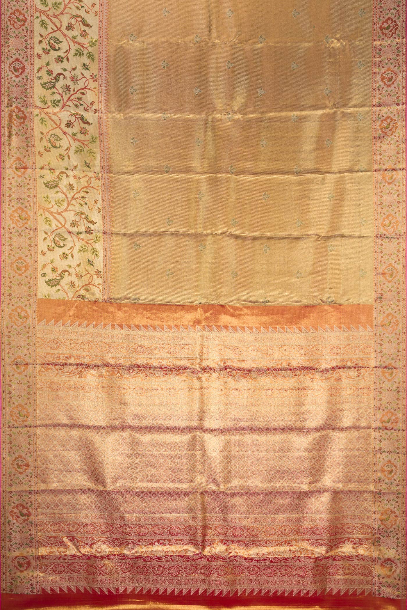 Flat view of Gold Dual Tone Kanjivaram Tissue Silk Saree with Zari Brocade on the body and Fancy Border. 
