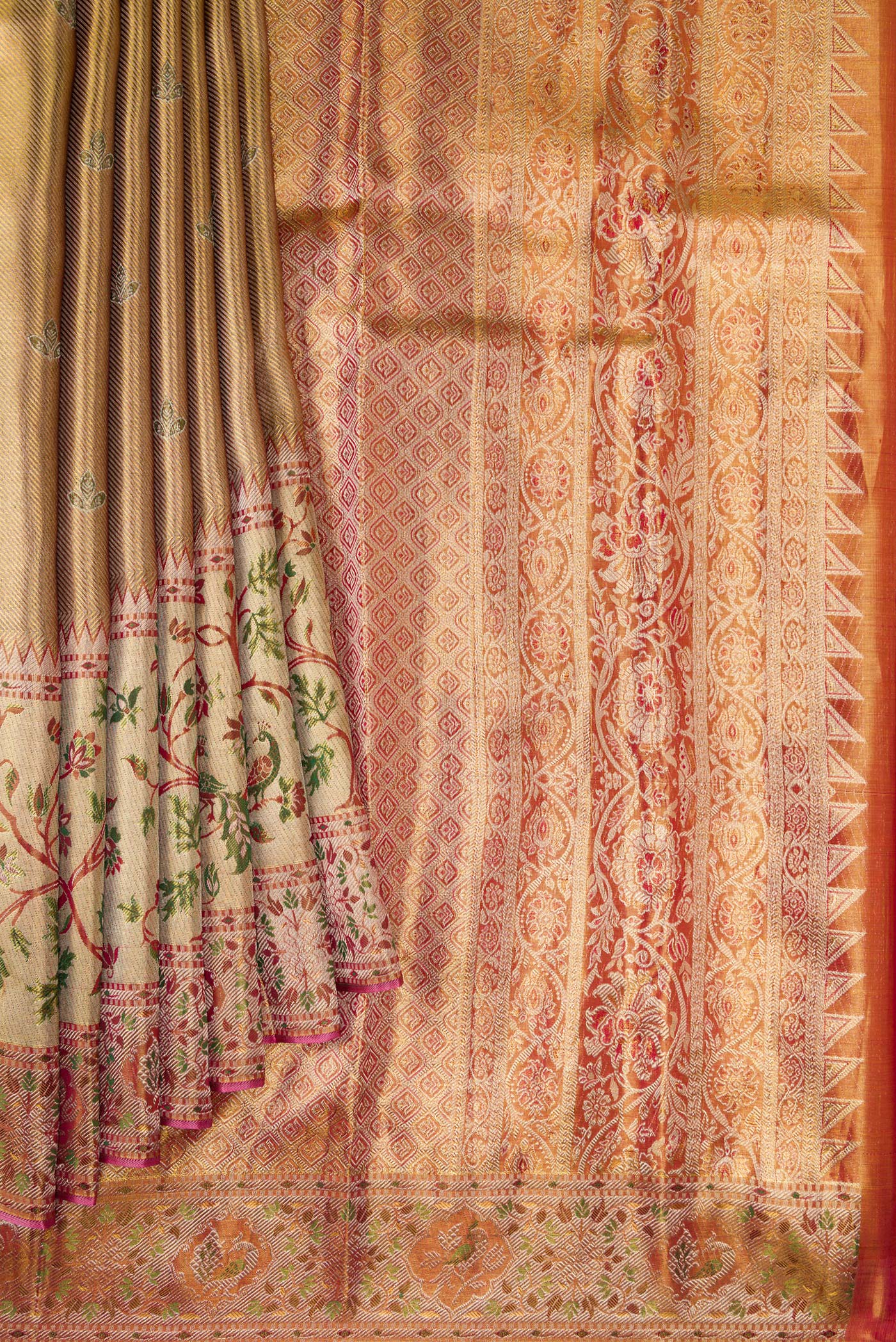 Pleats and pallu of Gold Dual Tone Kanjivaram Tissue Silk Saree with Zari Brocade on the body and Fancy Border. 