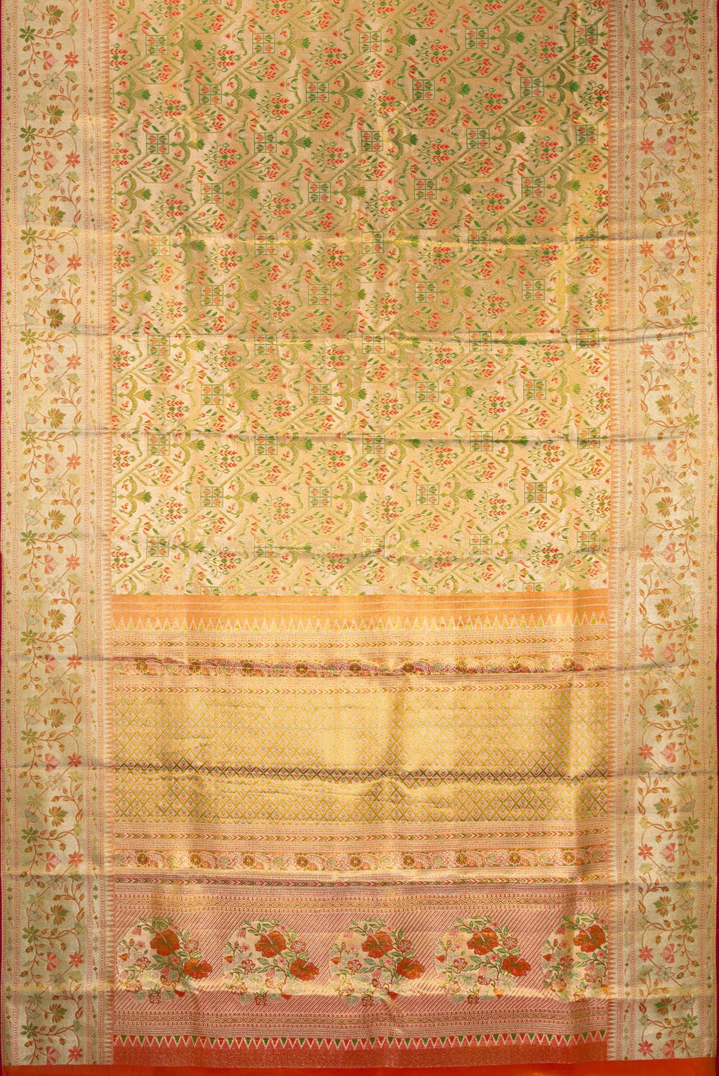 Flat view of Gold Dual Tone Kanjivaram Tissue Saree with Zari Brocade on the body and Fancy Border. 