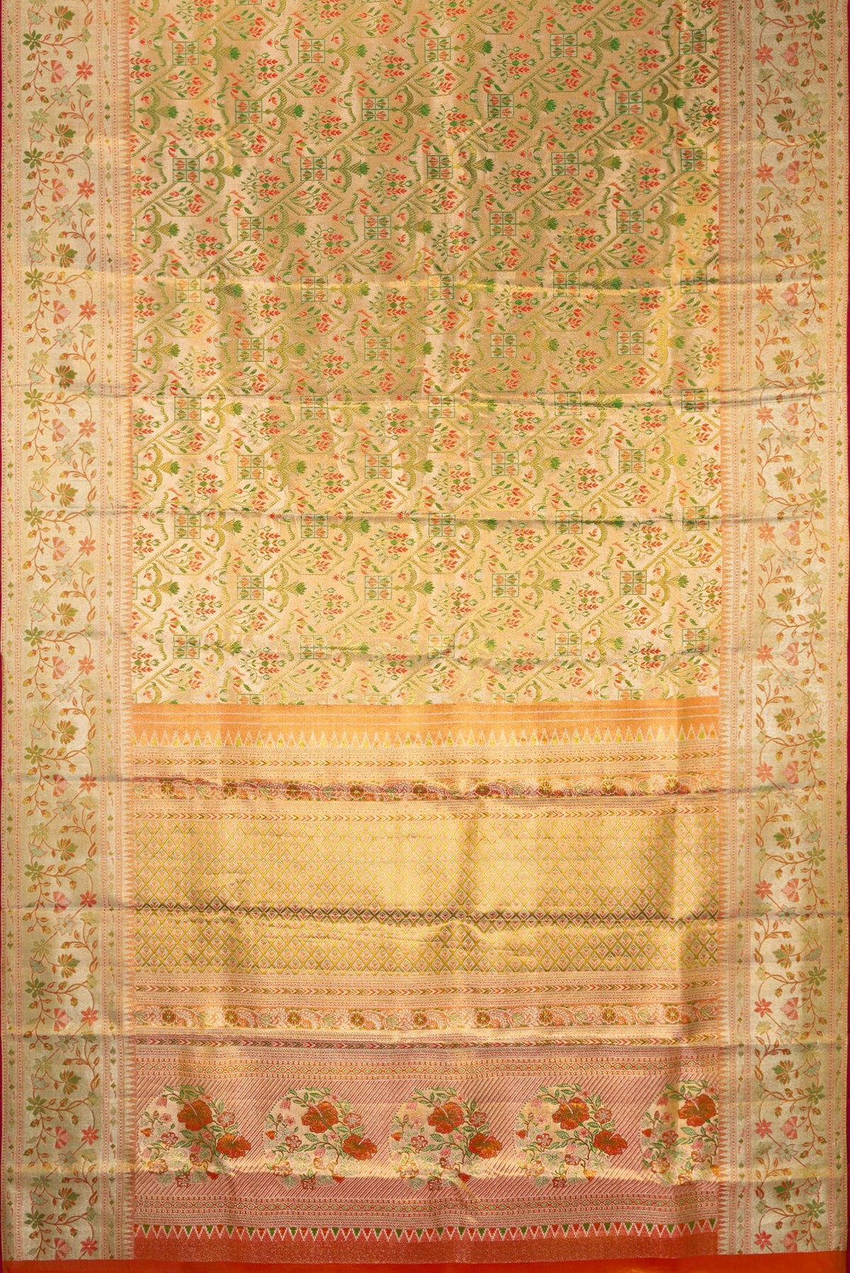 Flat view of Gold Dual Tone Kanjivaram Tissue Saree with Zari Brocade on the body and Fancy Border. 