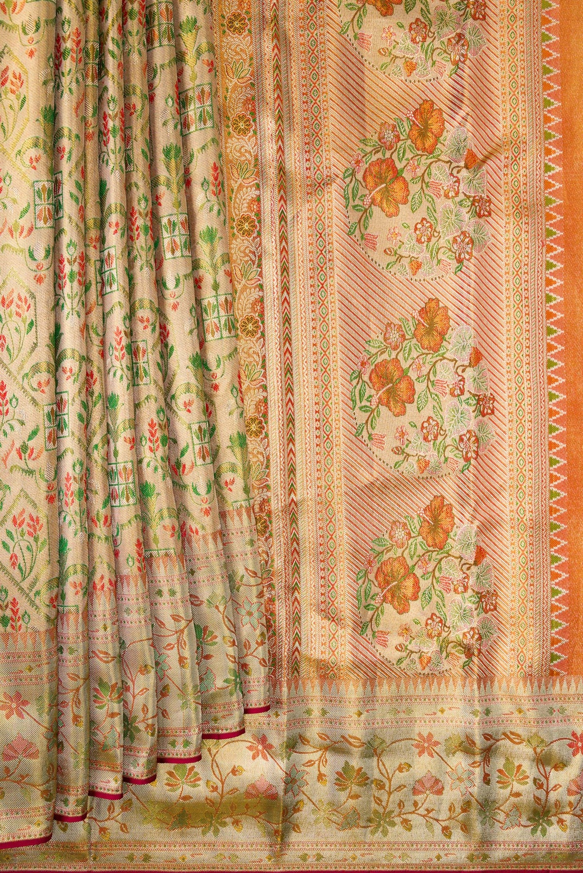 Pleats and pallu of Gold Dual Tone Kanjivaram Tissue Saree with Zari Brocade on the body and Fancy Border. 