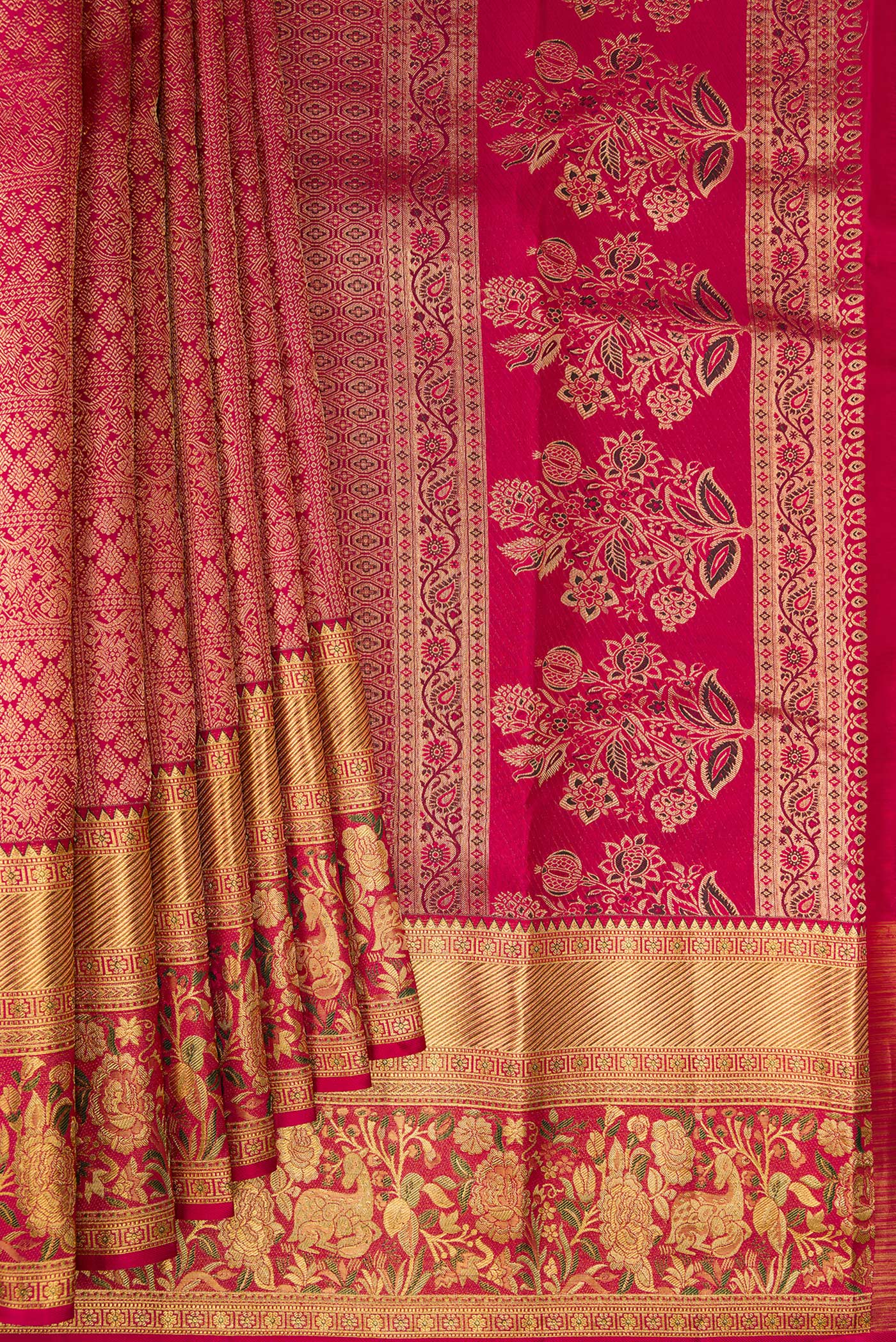 Pleats and pallu of Dark Pink Dual Tone Kanjivaram Silk Saree with Zari Brocade on the body and Fancy Border. 